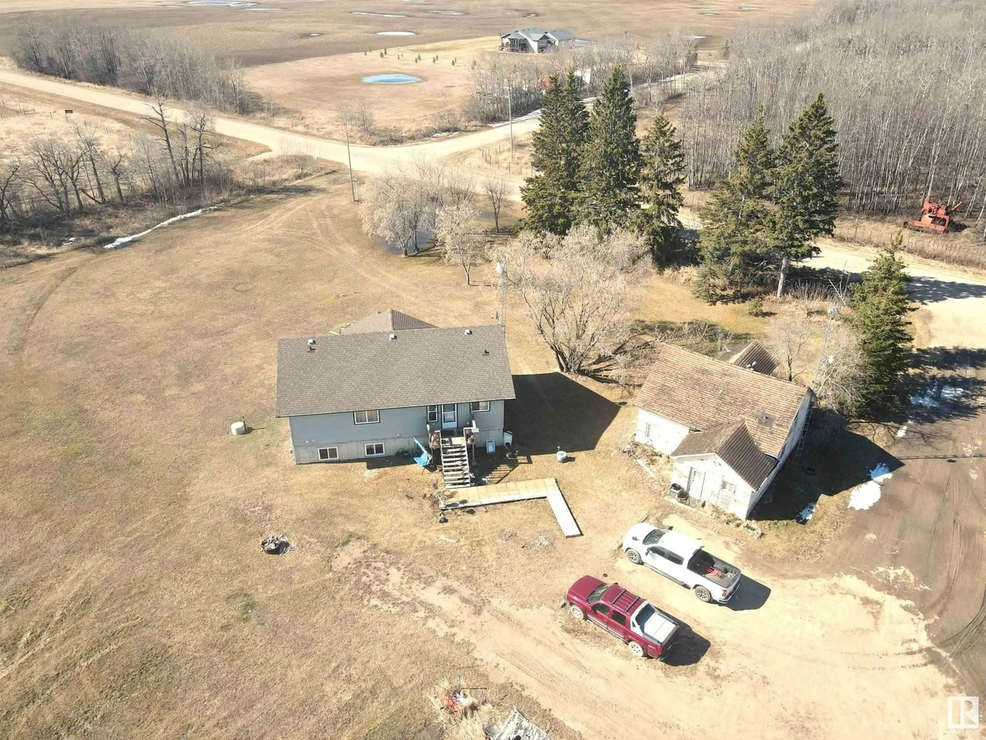 A pic from outside/outdoor area/front of a property/back of a property/a pic from drone, unknown for 61501 RGE RD 464, Rural Bonnyville M.D. Alberta T9N2G5