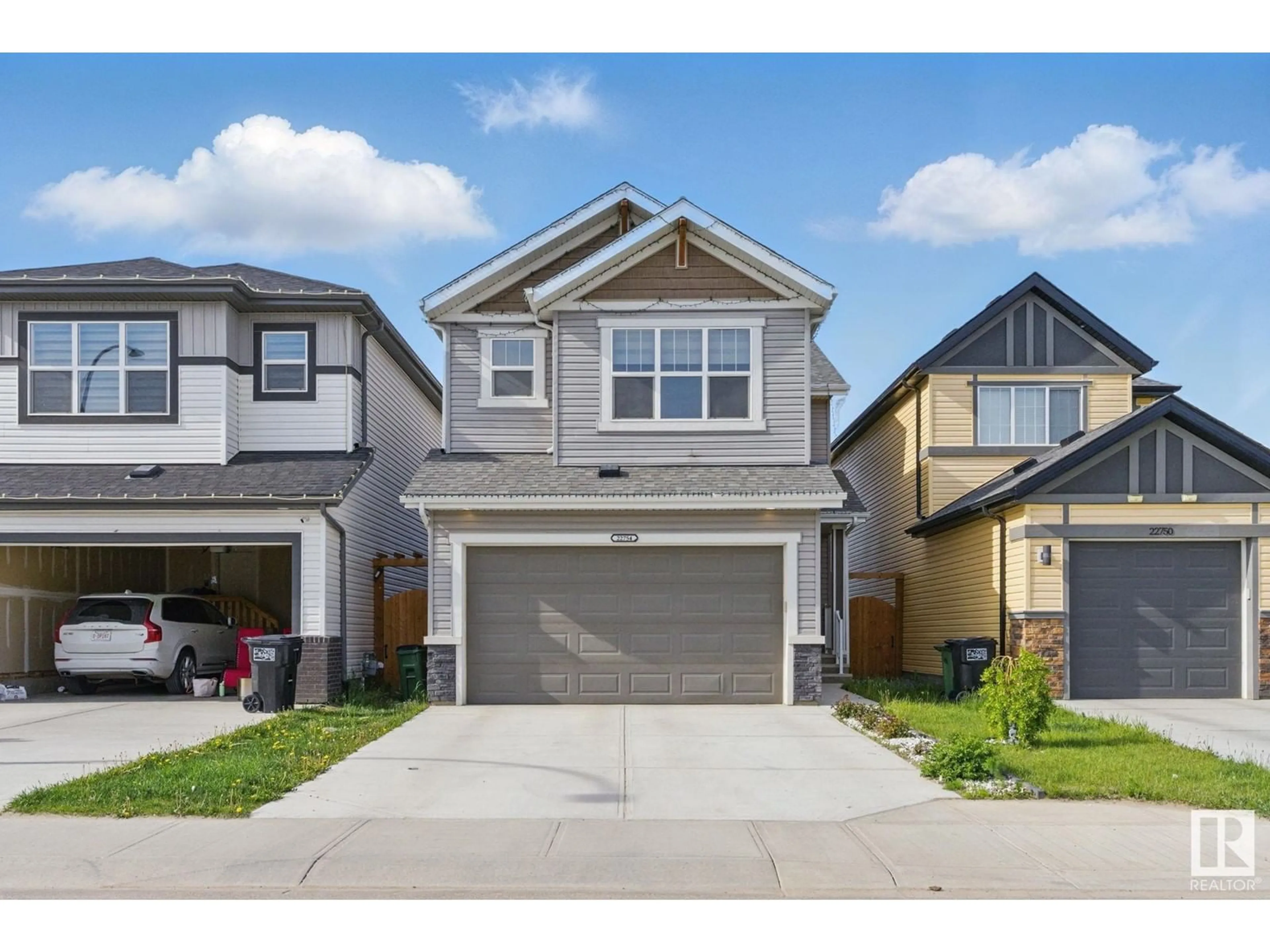 Home with vinyl exterior material, street for 22754 95A AV, Edmonton Alberta T5T7H5