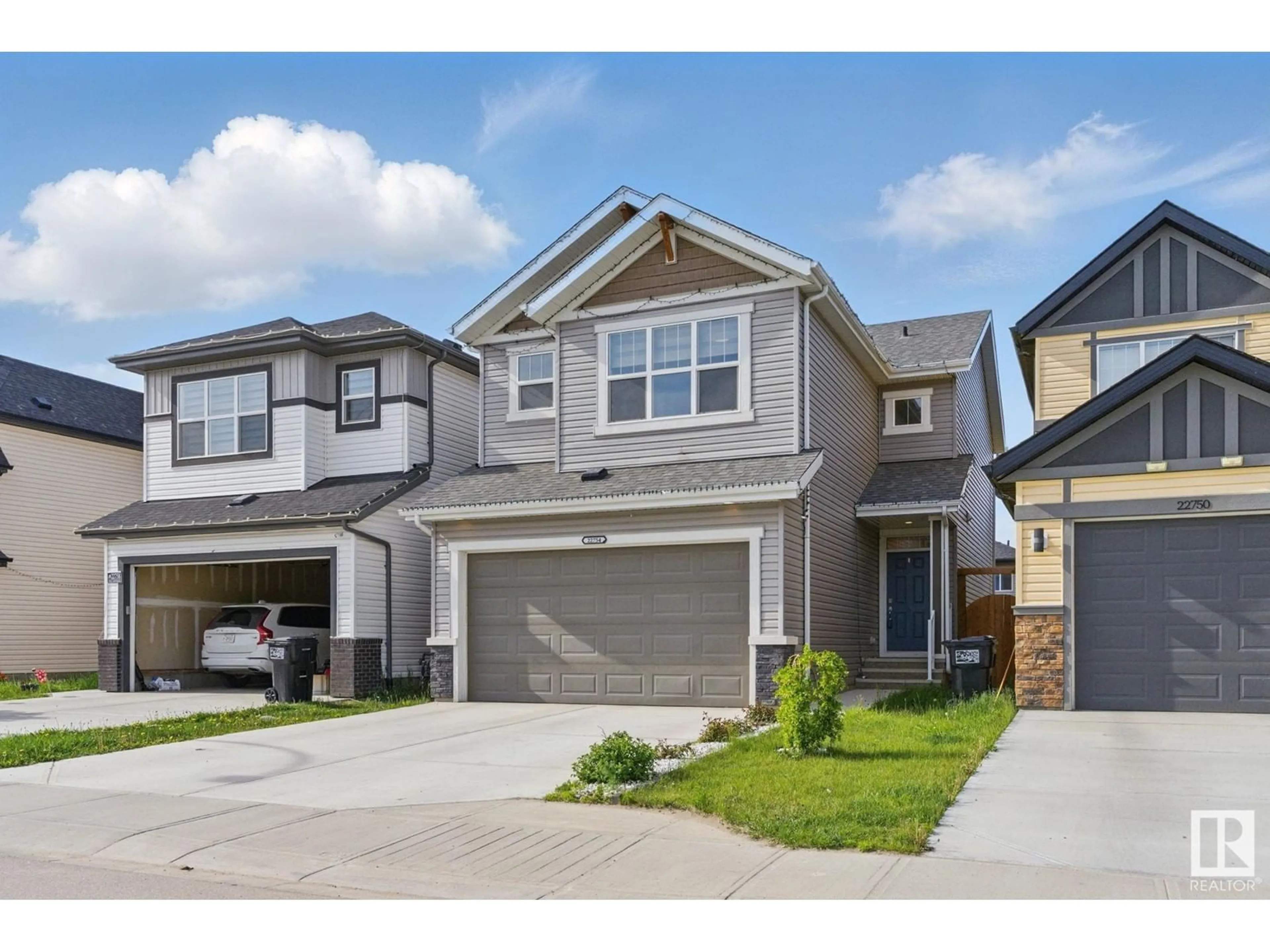 Home with vinyl exterior material, street for 22754 95A AV, Edmonton Alberta T5T7H5