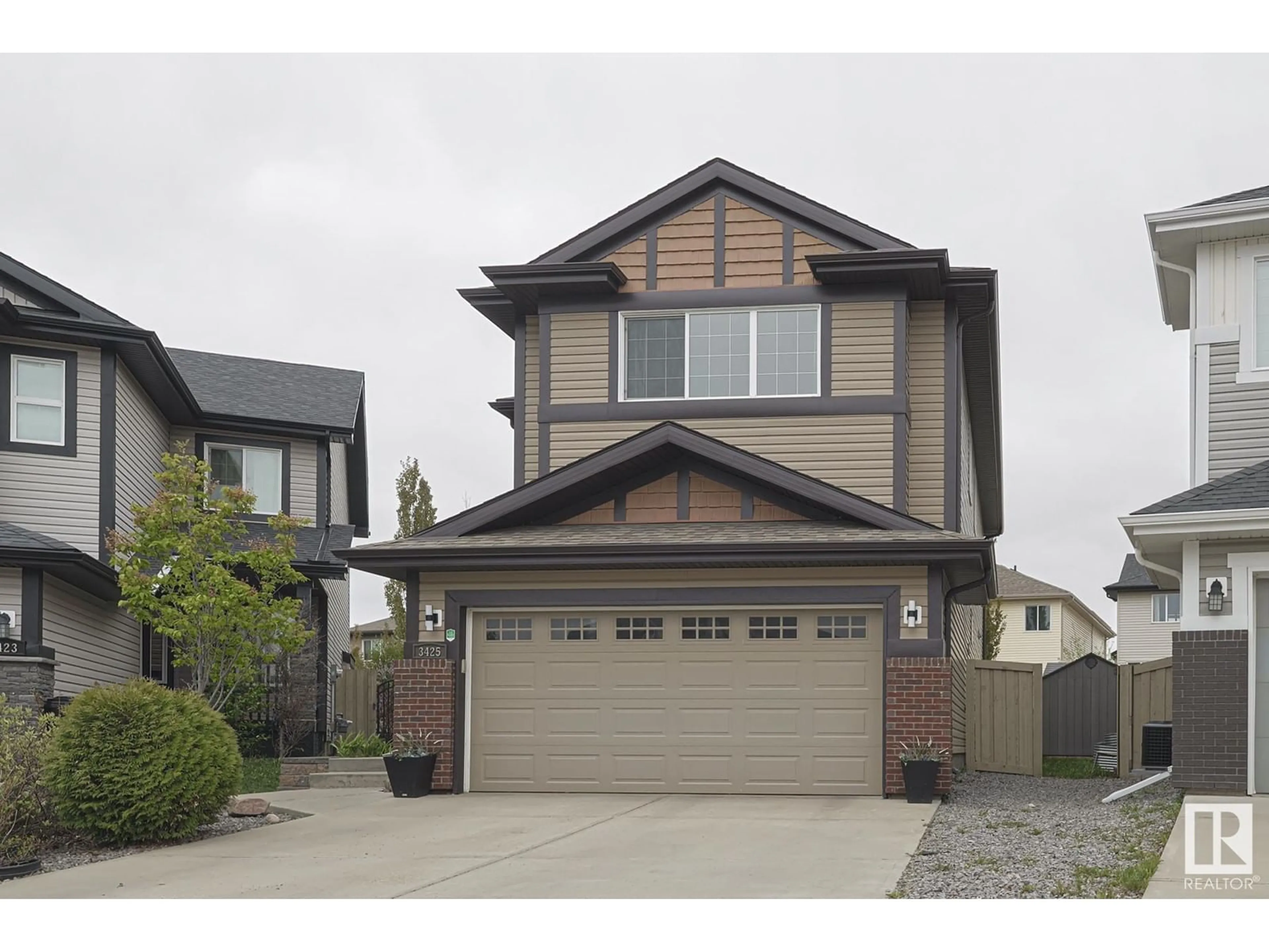 Home with vinyl exterior material, street for 3425 ABBOTT WY, Edmonton Alberta T6W2M3