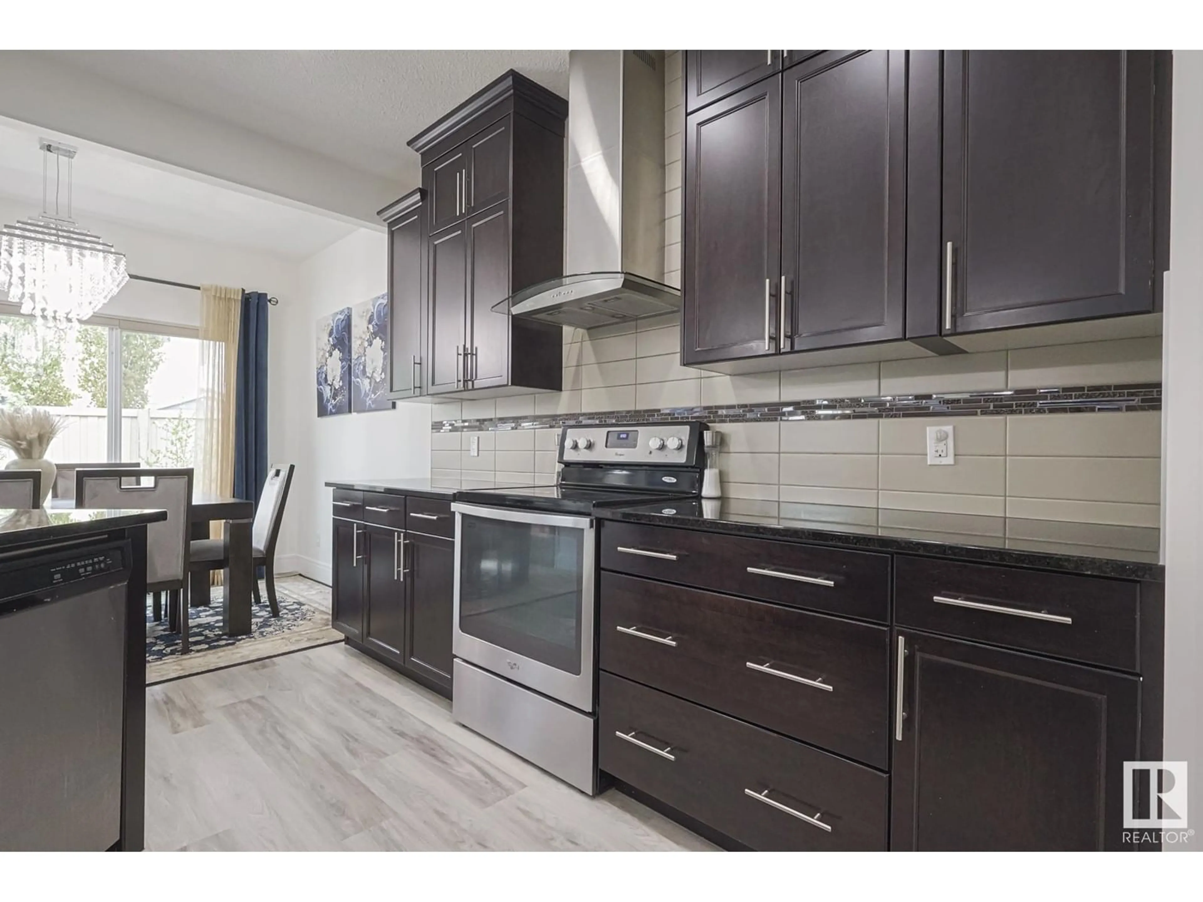 Open concept kitchen, ceramic/tile floor for 3425 ABBOTT WY, Edmonton Alberta T6W2M3