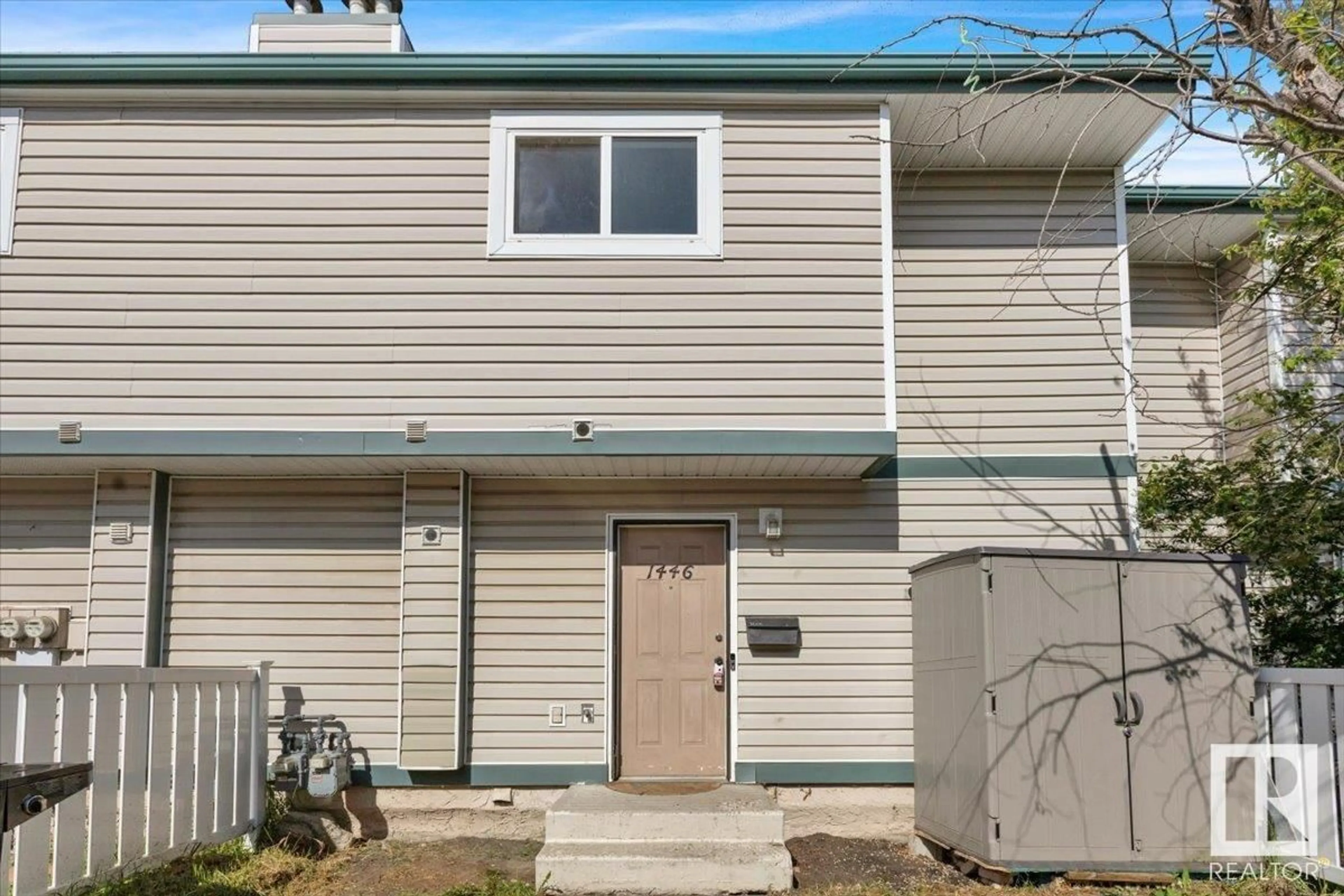 Home with vinyl exterior material, street for 1446 LAKEWOOD RD, Edmonton Alberta T6K3M2