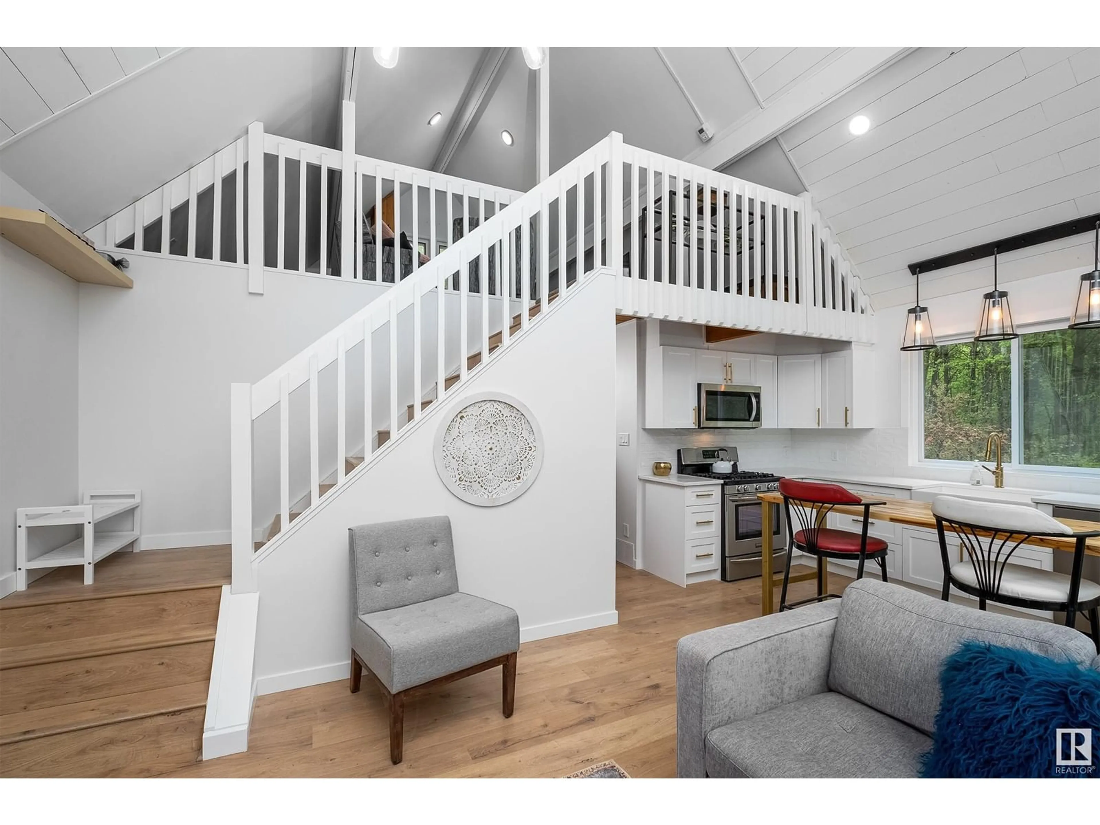 Open concept kitchen, wood/laminate floor for 3 - 54127 RGE ROAD 30, Rural Lac Ste. Anne County Alberta T0E0A0