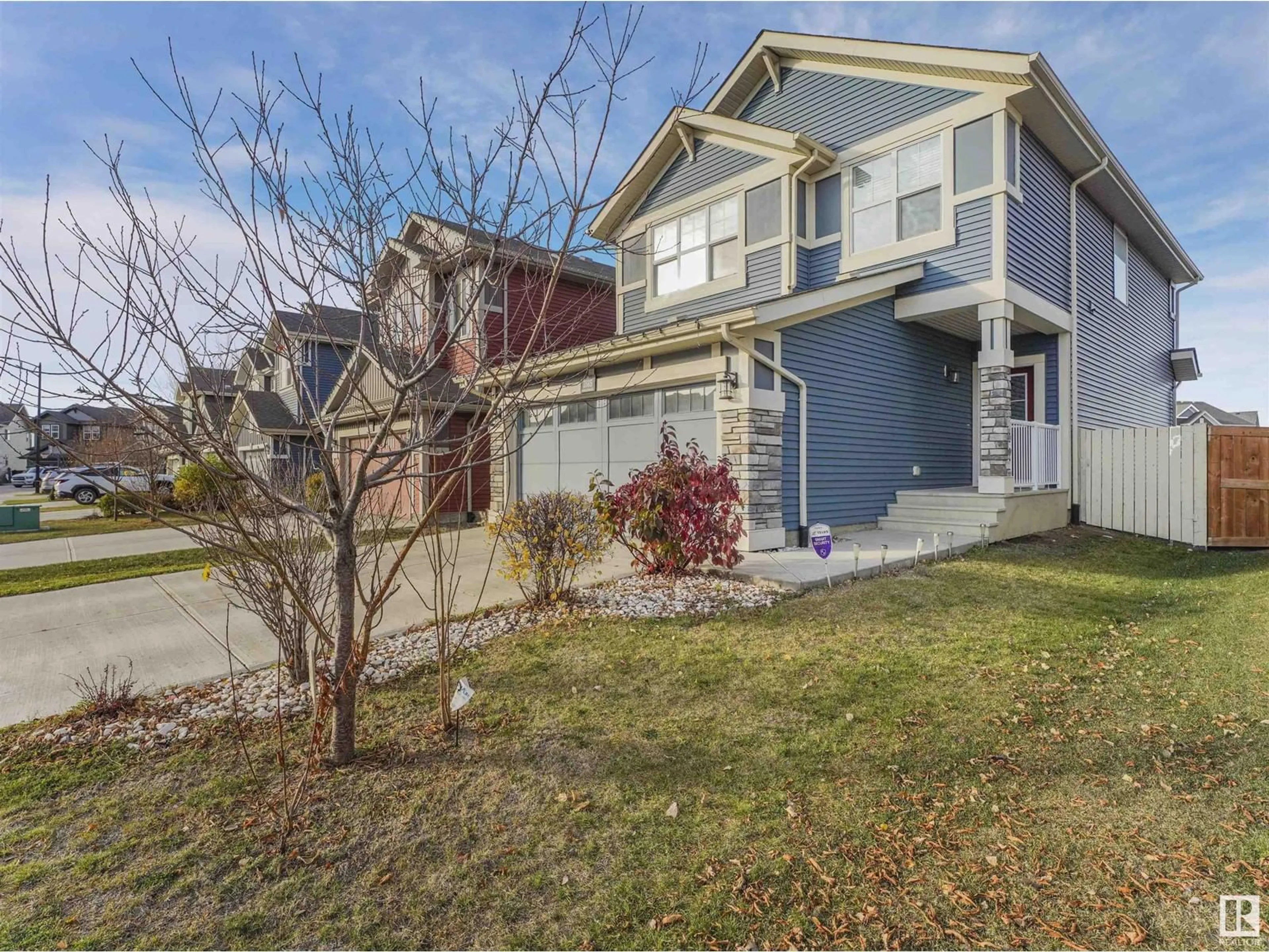 Home with vinyl exterior material, street for 3565 CHERRY LANDING LD, Edmonton Alberta T6X2B5