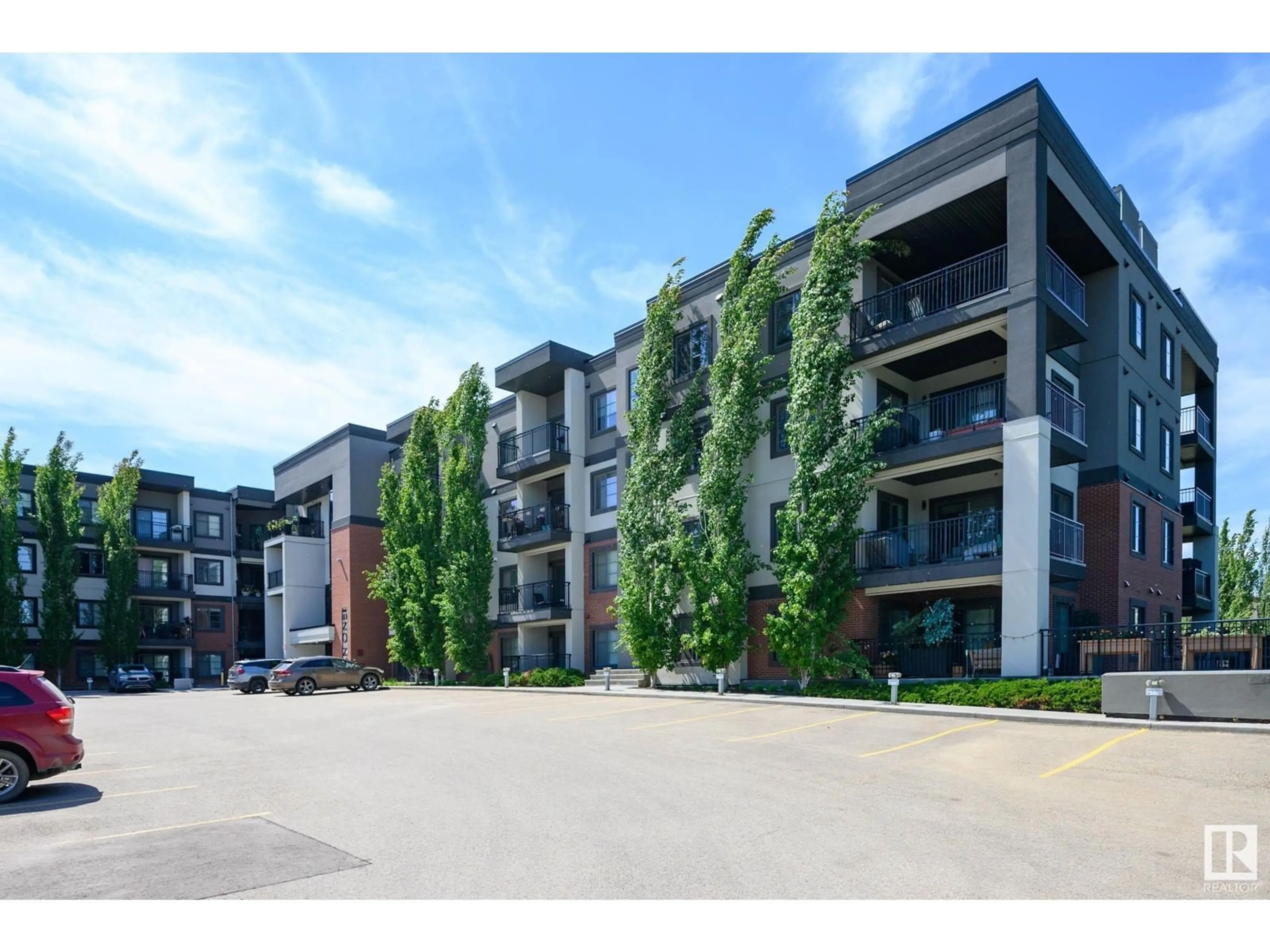 A pic from outside/outdoor area/front of a property/back of a property/a pic from drone, building for 318 - 1144 ADAMSON DR, Edmonton Alberta T6W2X7