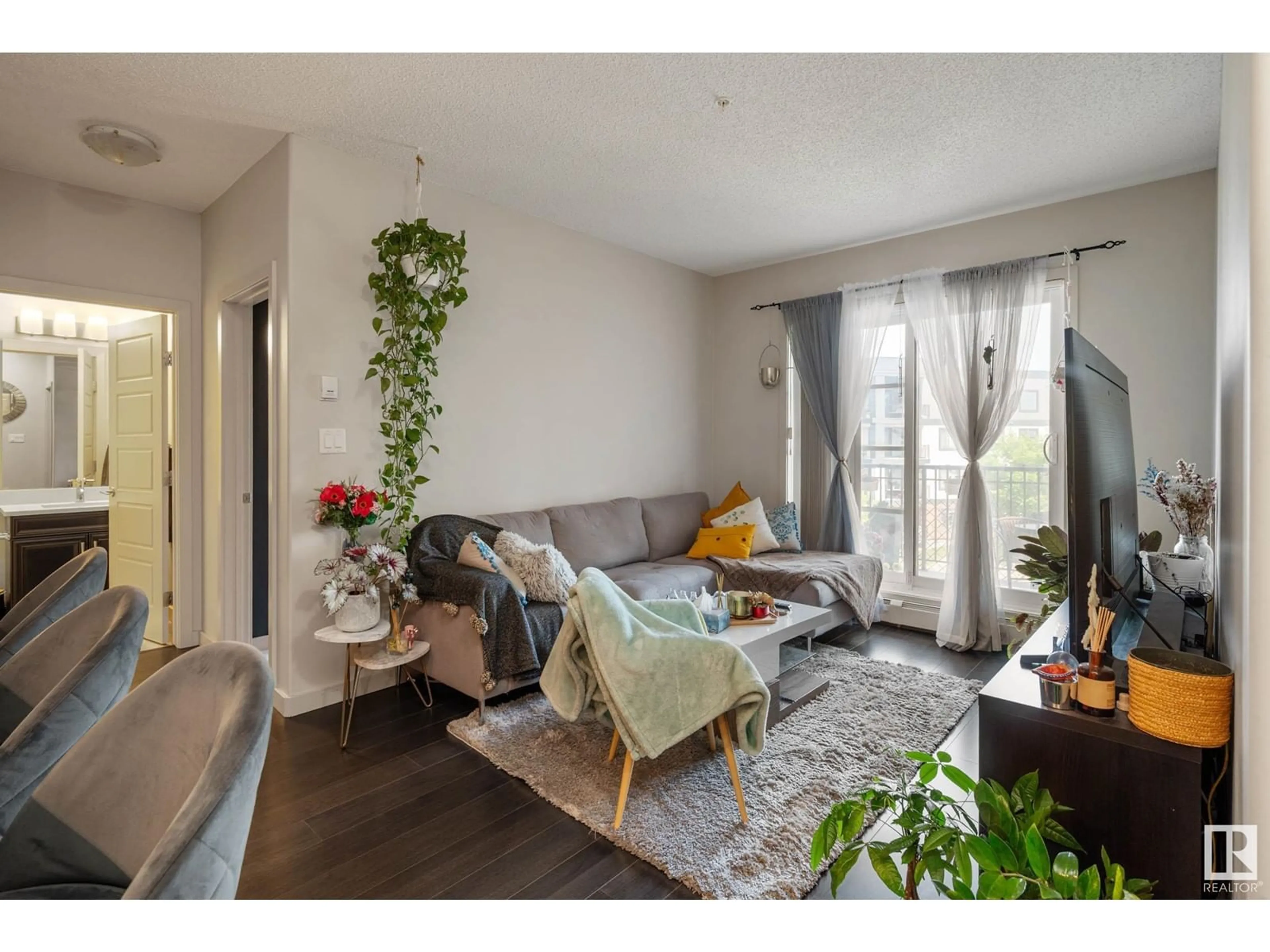 Living room with furniture, unknown for 318 - 1144 ADAMSON DR, Edmonton Alberta T6W2X7