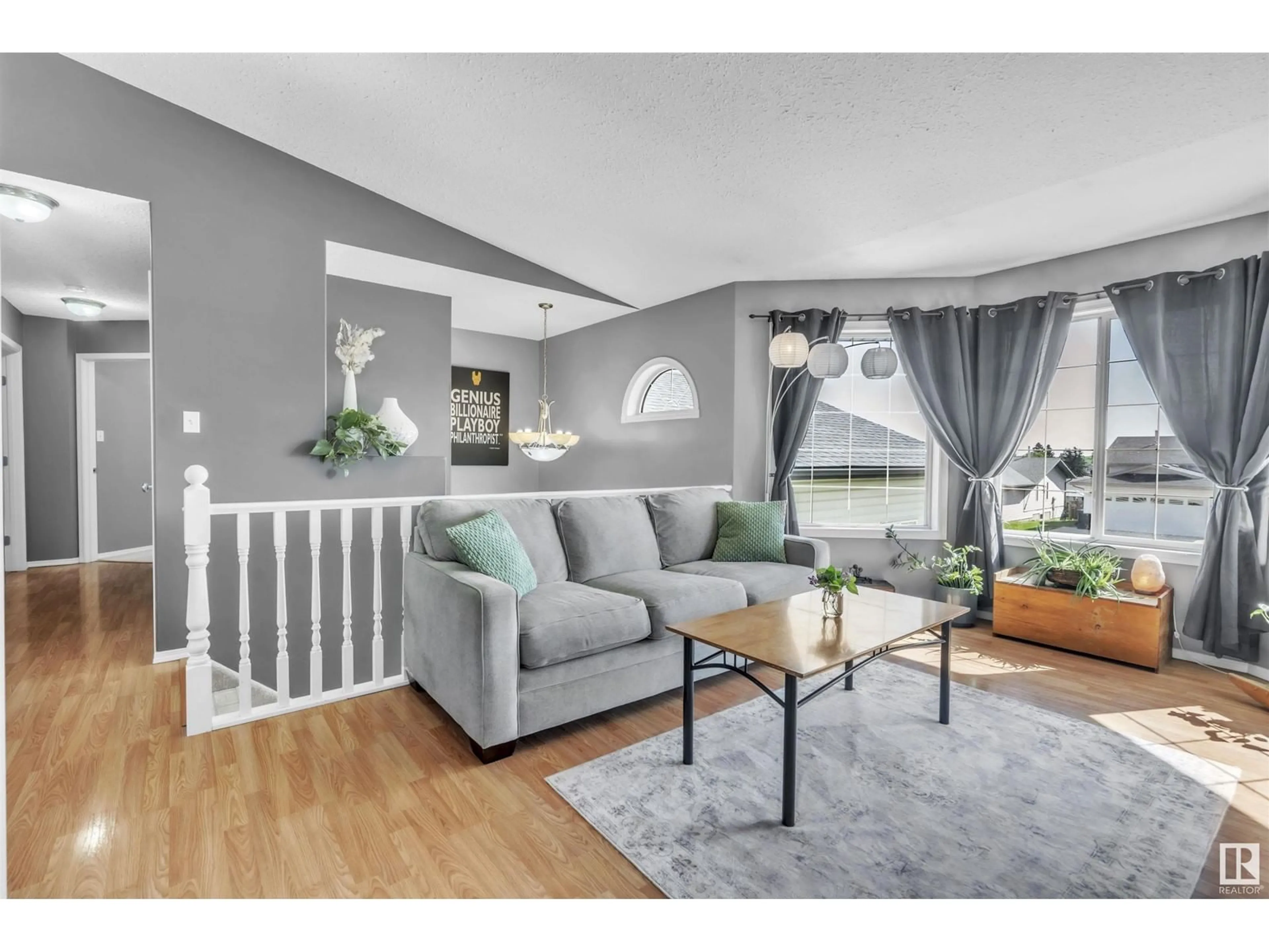 Living room with furniture, wood/laminate floor for 1503 14 ST, Cold Lake Alberta T9M1Z8