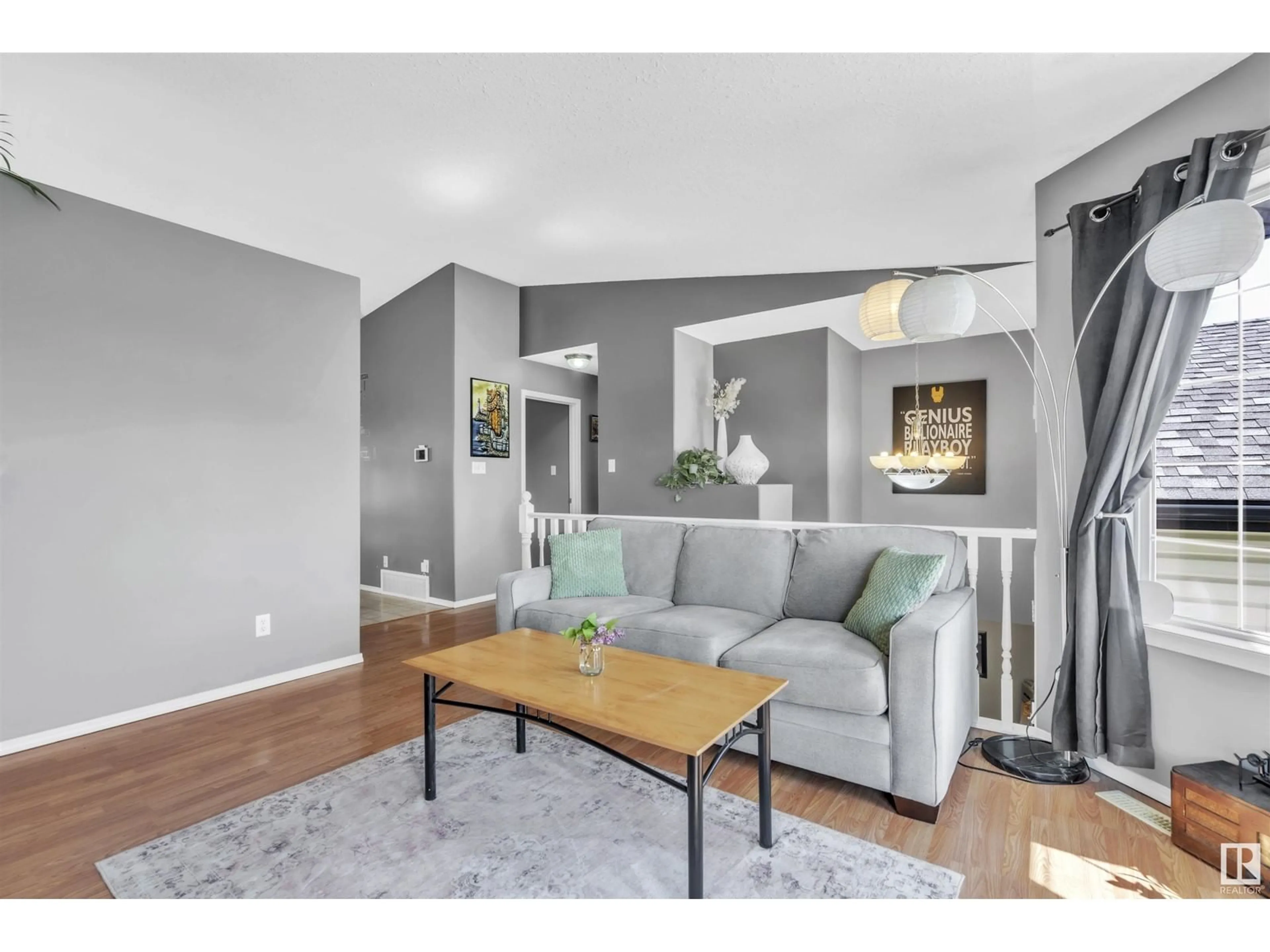 Living room with furniture, wood/laminate floor for 1503 14 ST, Cold Lake Alberta T9M1Z8
