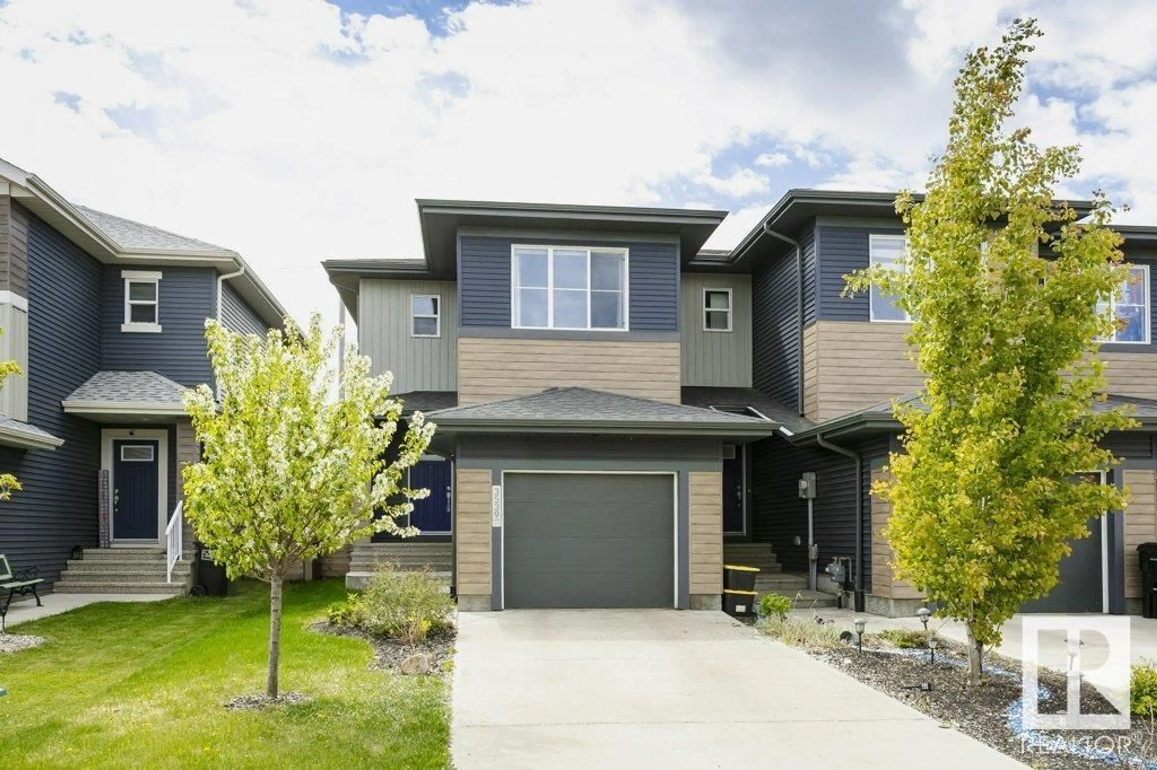 Home with vinyl exterior material, street for 3539 8 AV, Edmonton Alberta T6X2G6