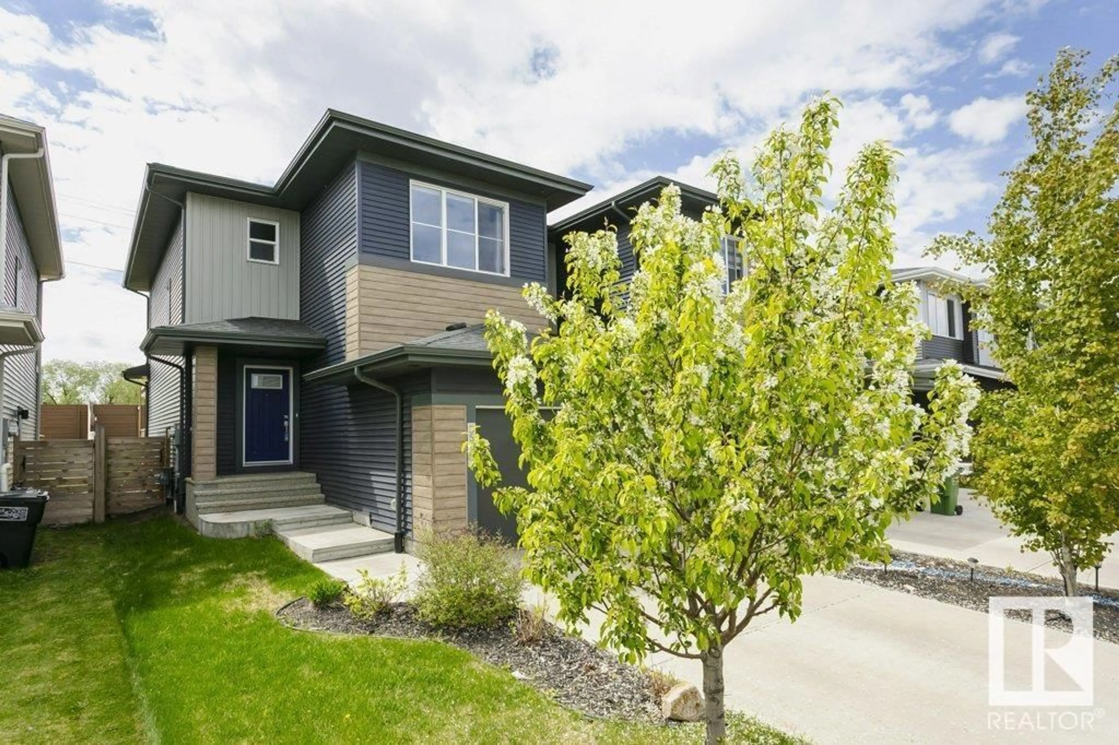 Home with vinyl exterior material, street for 3539 8 AV, Edmonton Alberta T6X2G6