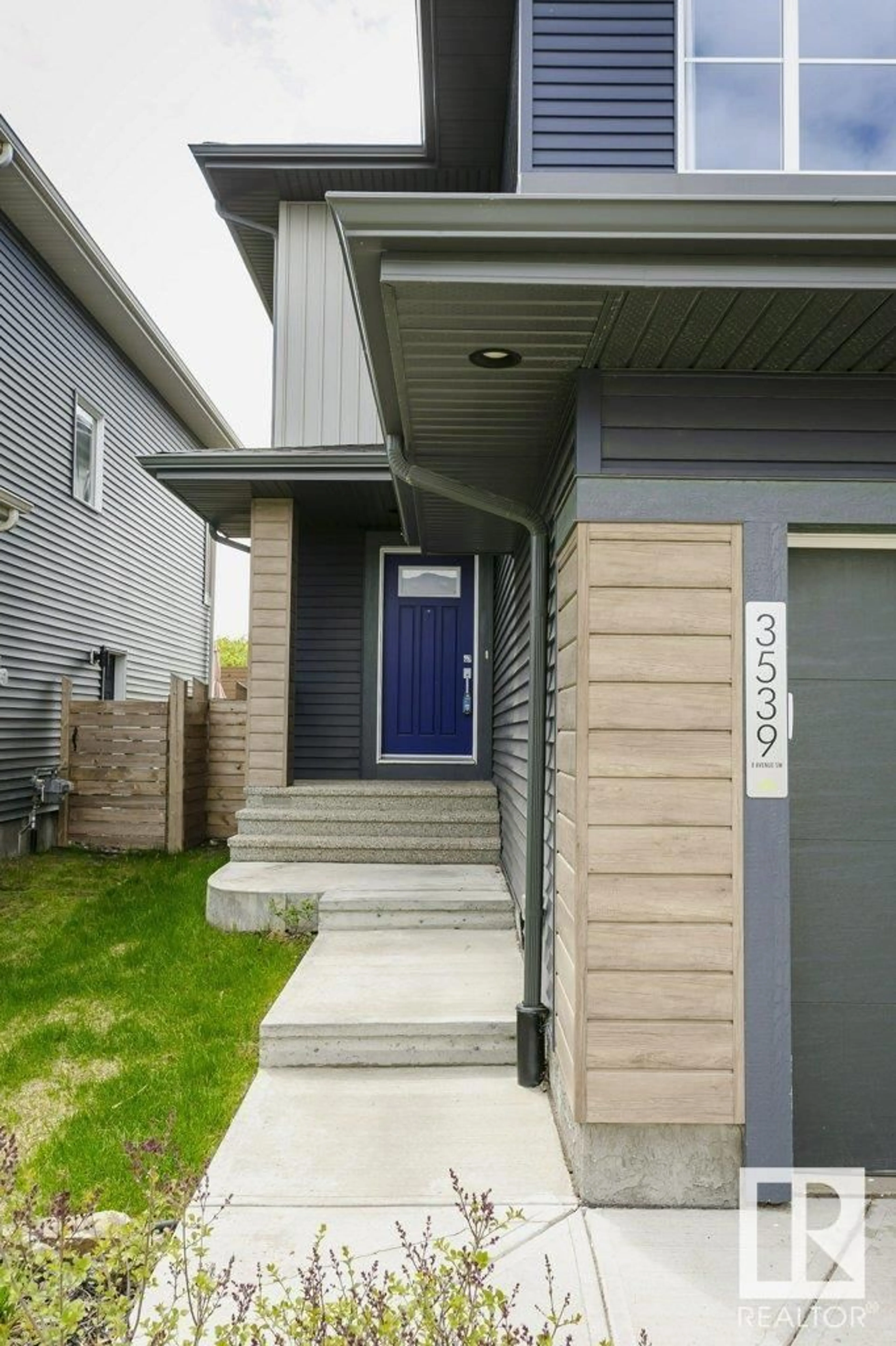 Home with vinyl exterior material, street for 3539 8 AV, Edmonton Alberta T6X2G6