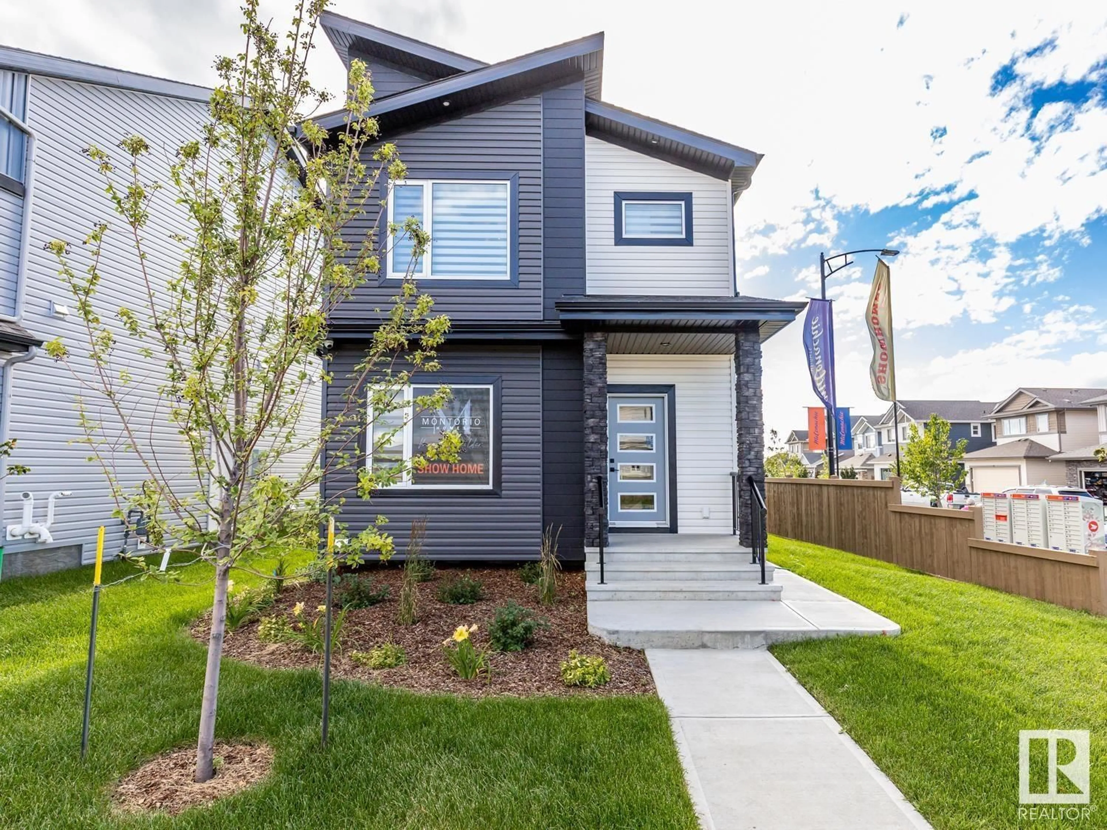 Home with vinyl exterior material, street for NW - 17740 63 ST, Edmonton Alberta T5Y3C5