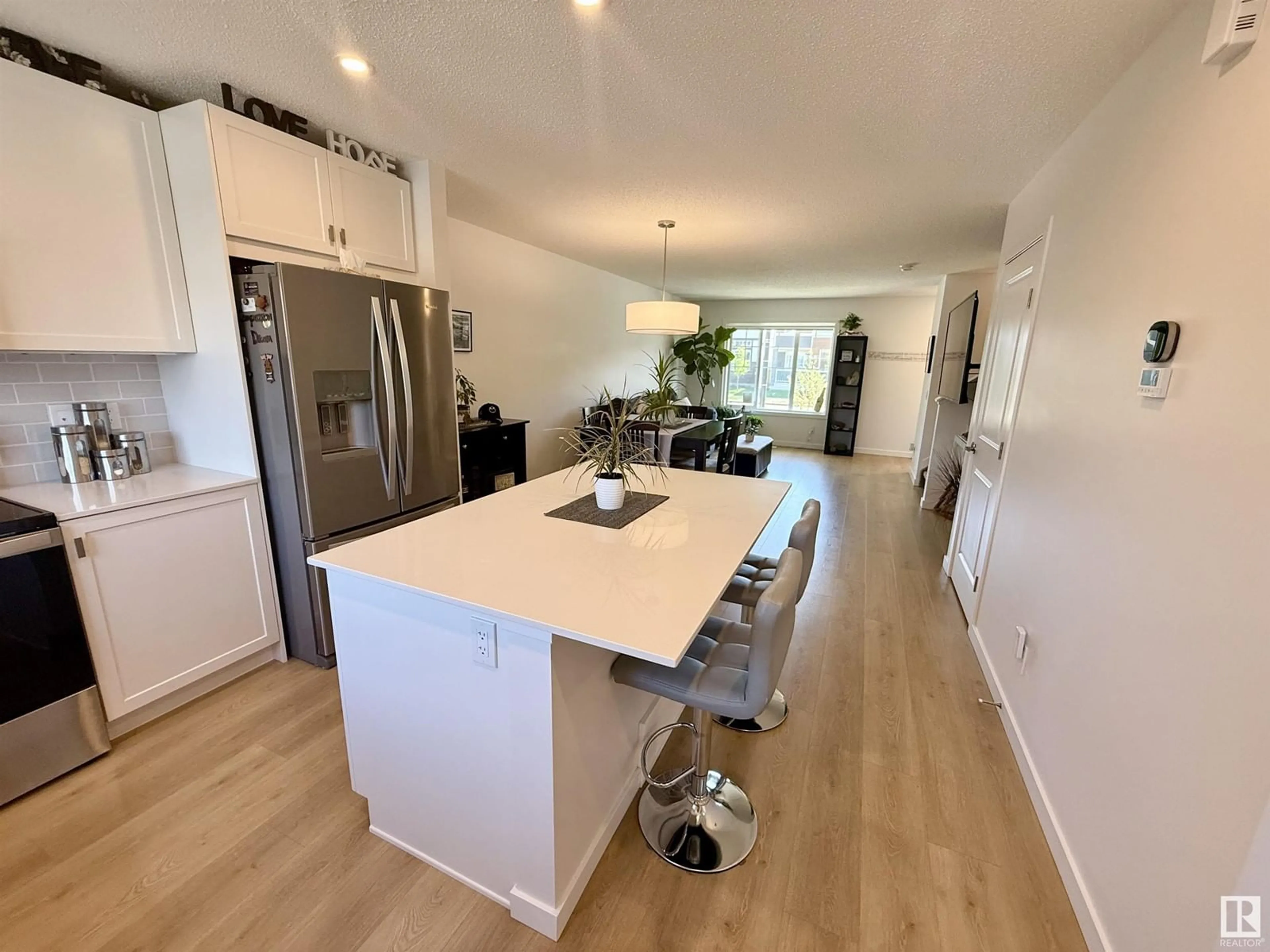 Open concept kitchen, unknown for 2424 TRUMPETER WY, Edmonton Alberta T5S0R9