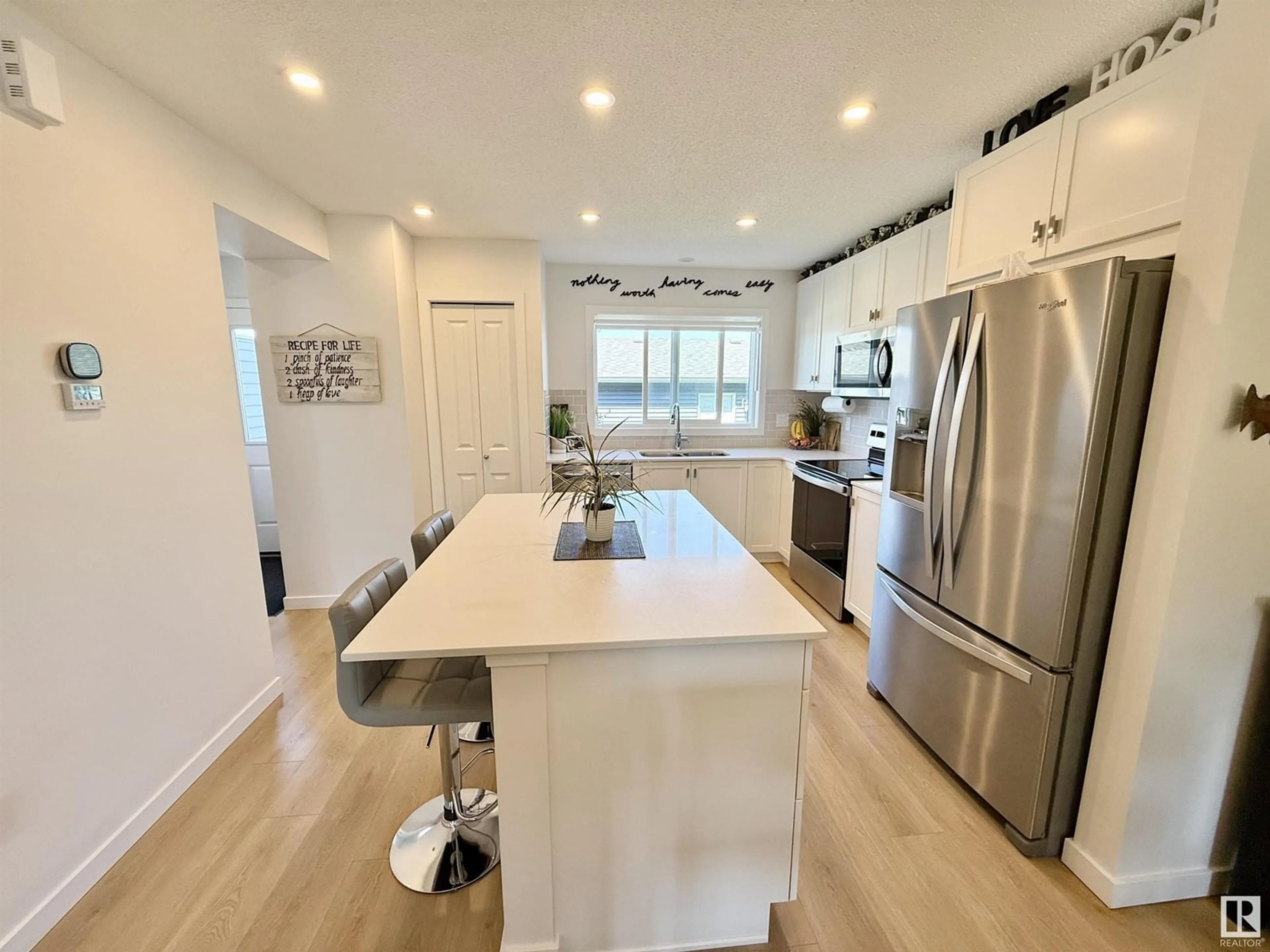 Open concept kitchen, unknown for 2424 TRUMPETER WY, Edmonton Alberta T5S0R9