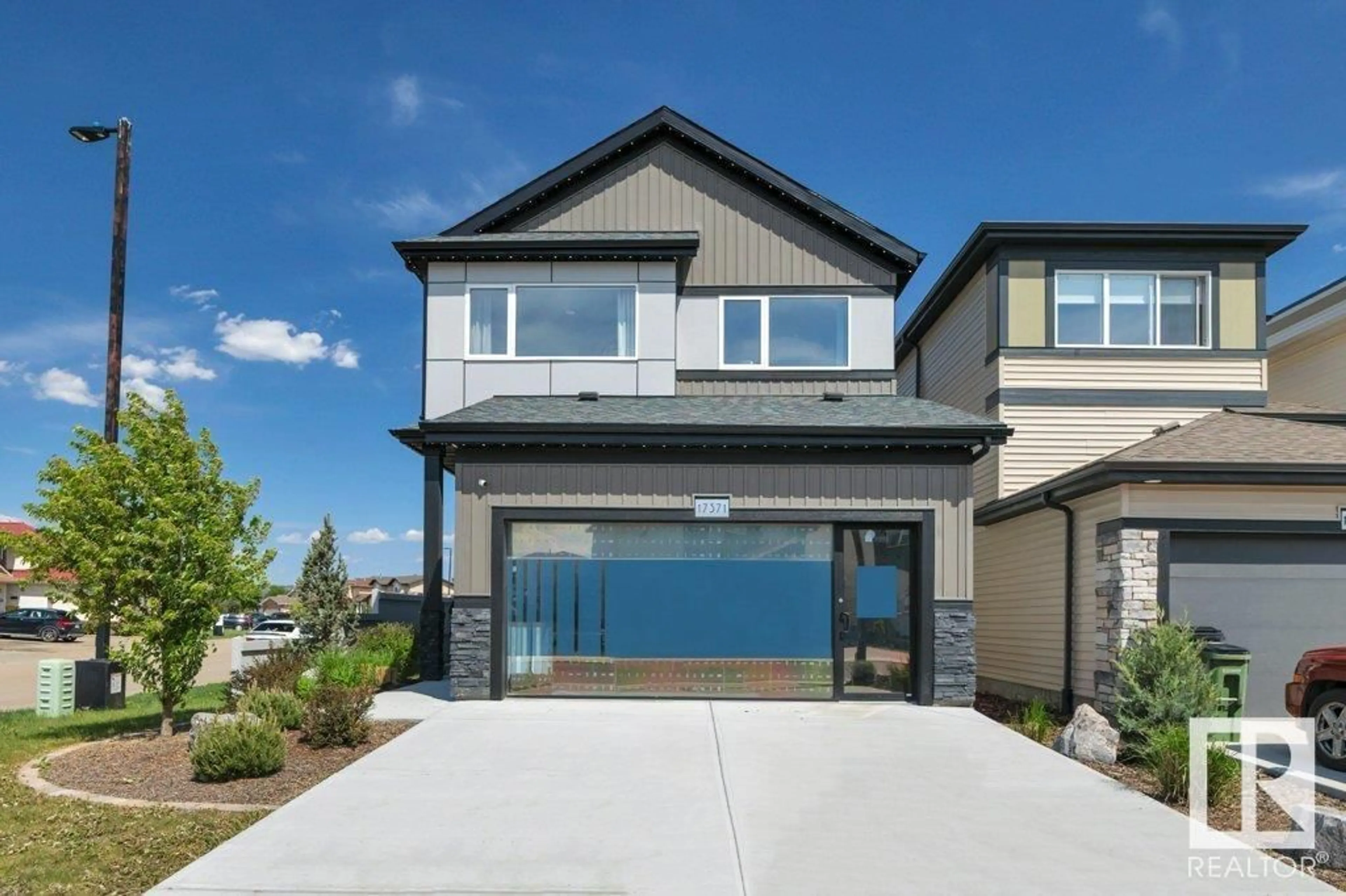 Home with brick exterior material, street for NW - 17371 100 ST, Edmonton Alberta T5X4E1