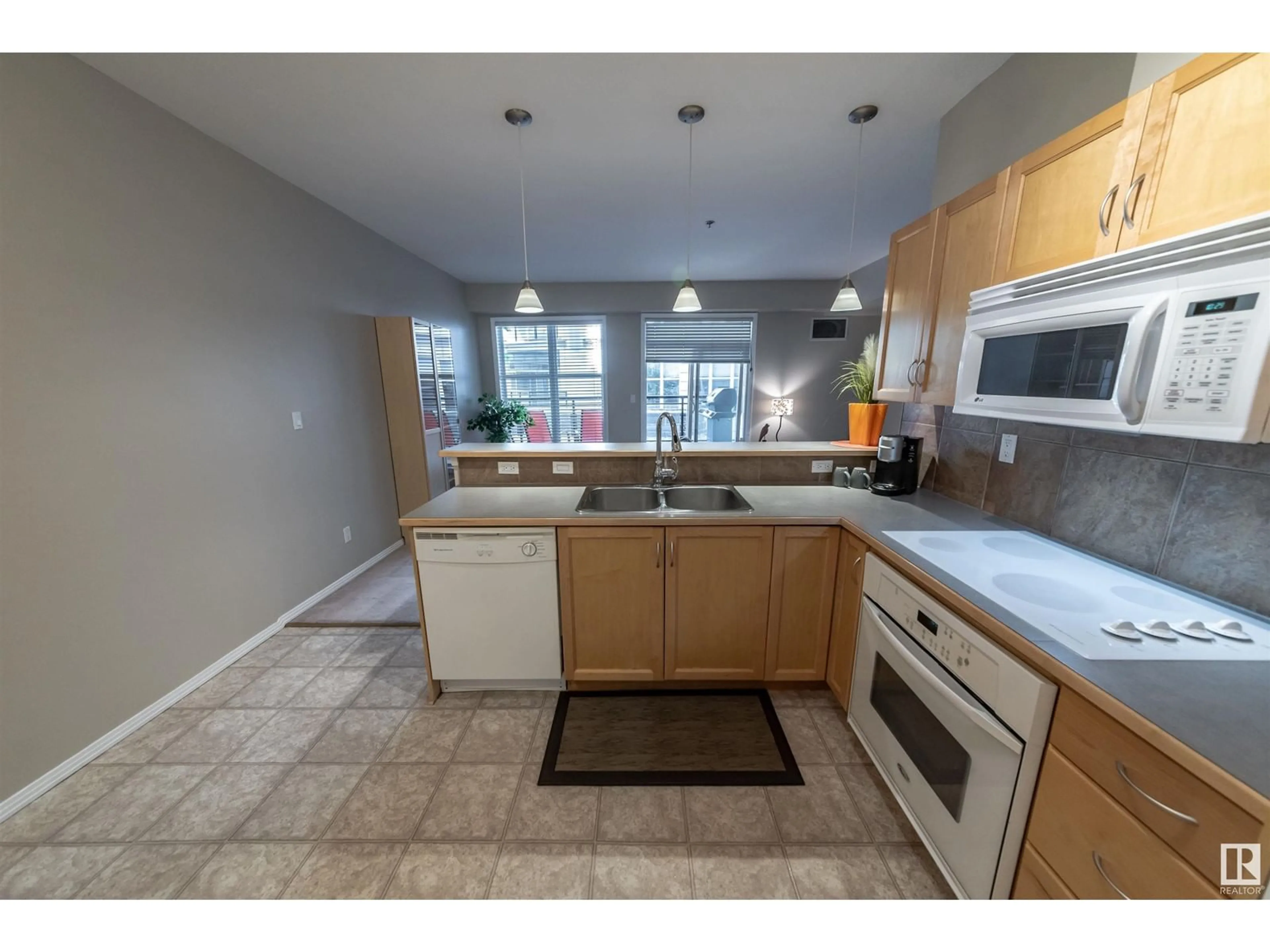 Standard kitchen, ceramic/tile floor for 4827 - 150 104A ST NW, Edmonton Alberta T6H0R5