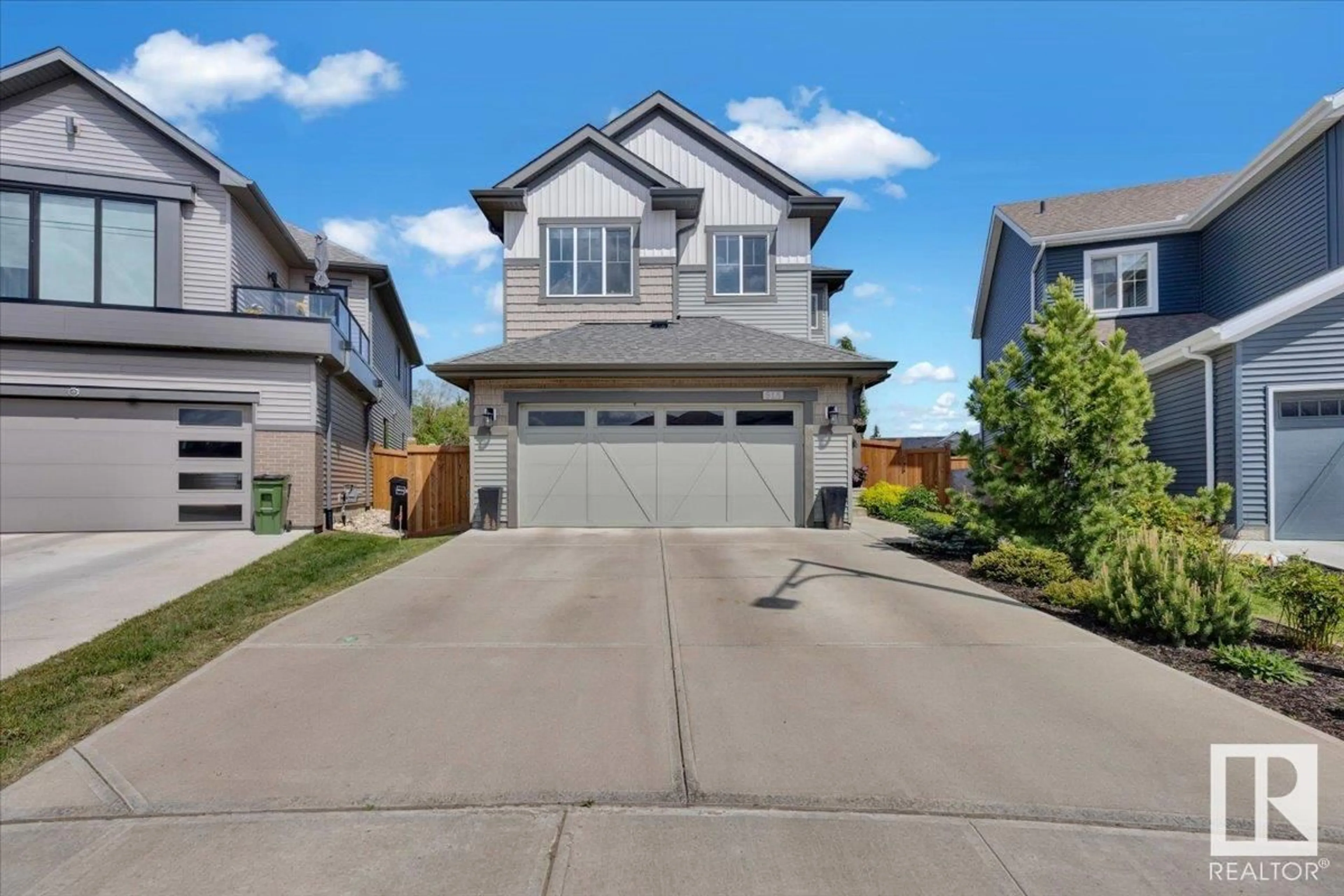 A pic from outside/outdoor area/front of a property/back of a property/a pic from drone, street for NW - 515 EAGLETON WD, Edmonton Alberta T6M0Y5