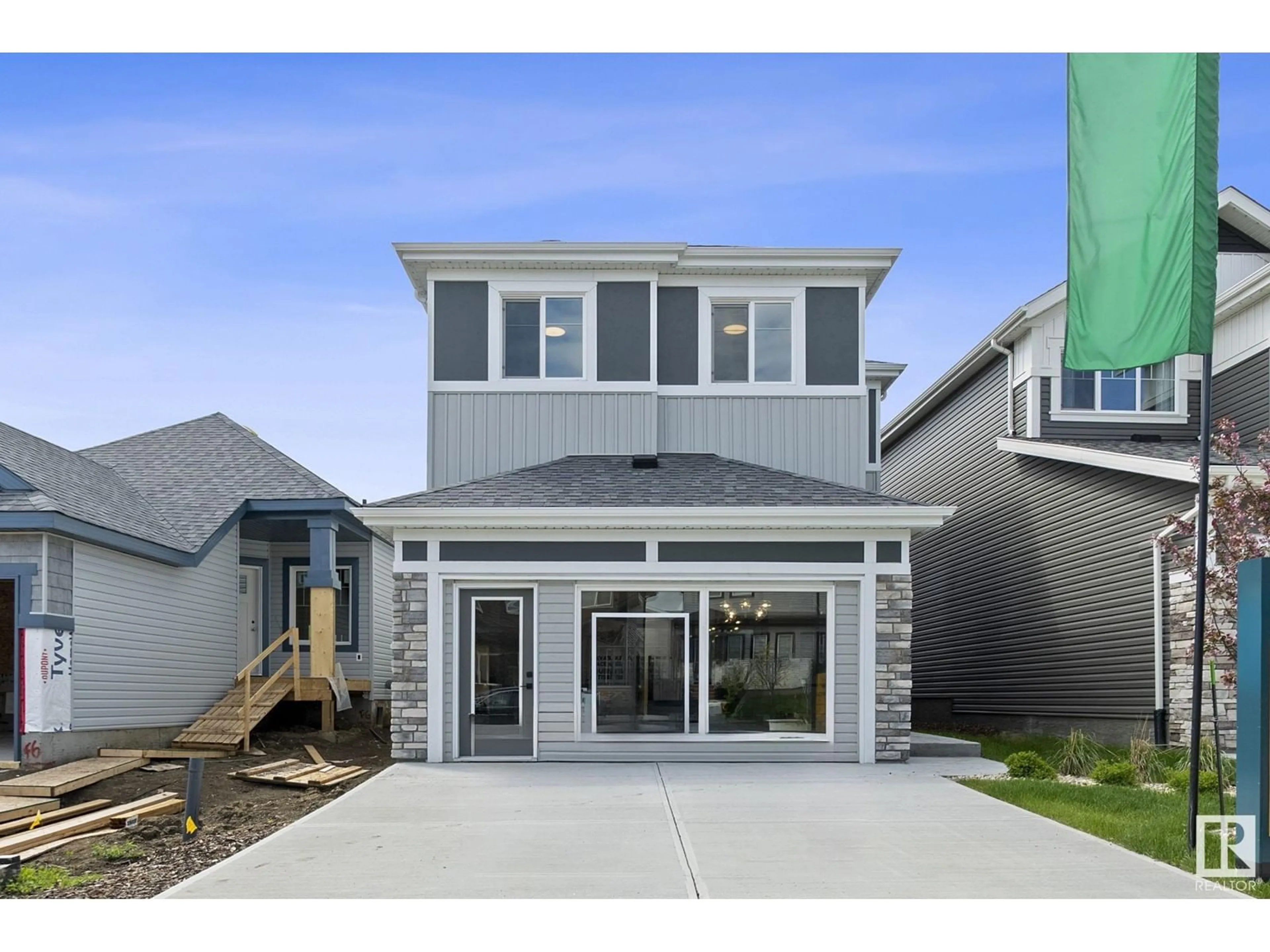 Home with vinyl exterior material, street for 103 DANSEREAU WY, Beaumont Alberta T4X3E2