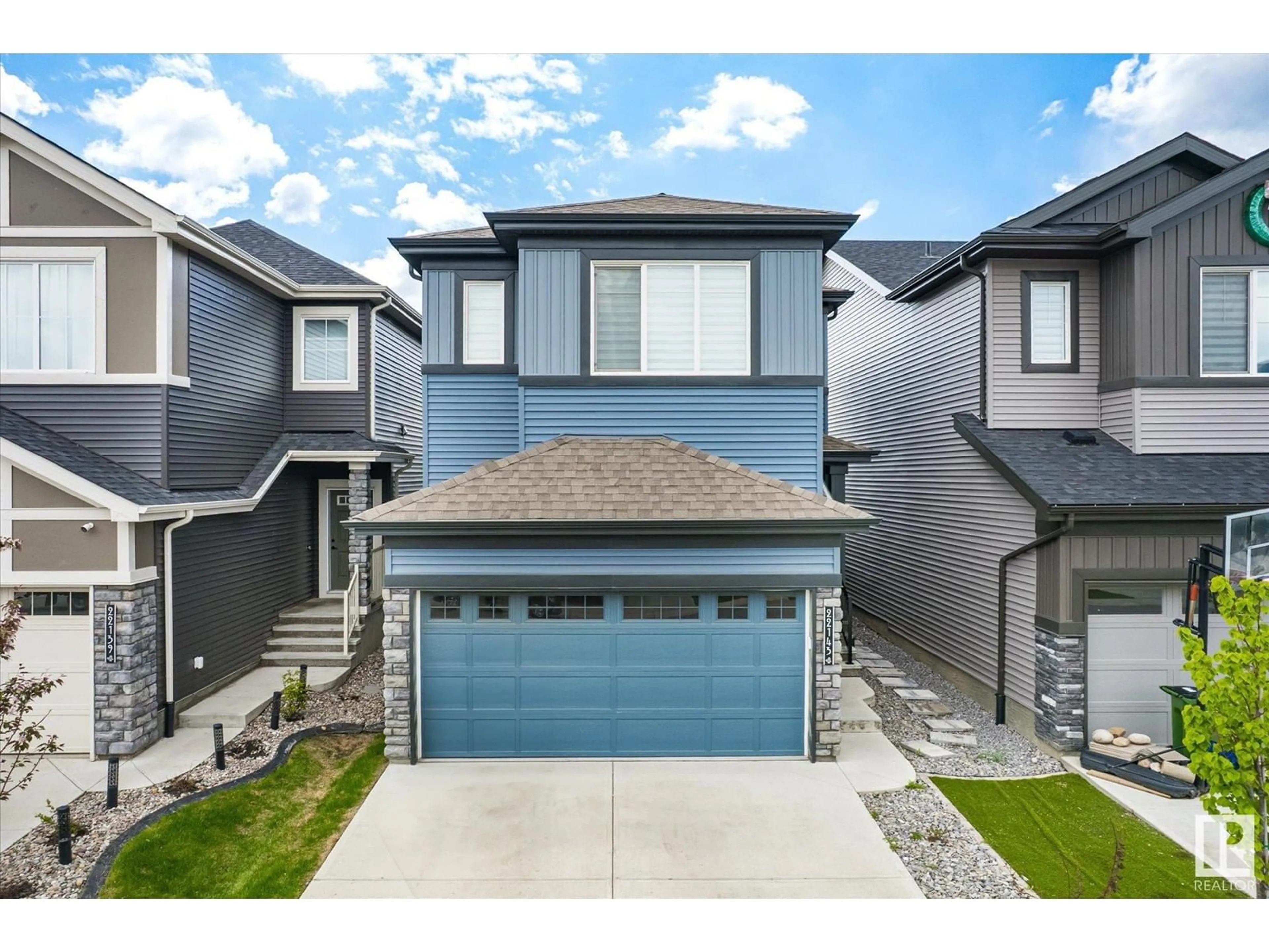 Home with vinyl exterior material, street for NW - 22143 80 AV, Edmonton Alberta T5T4S2