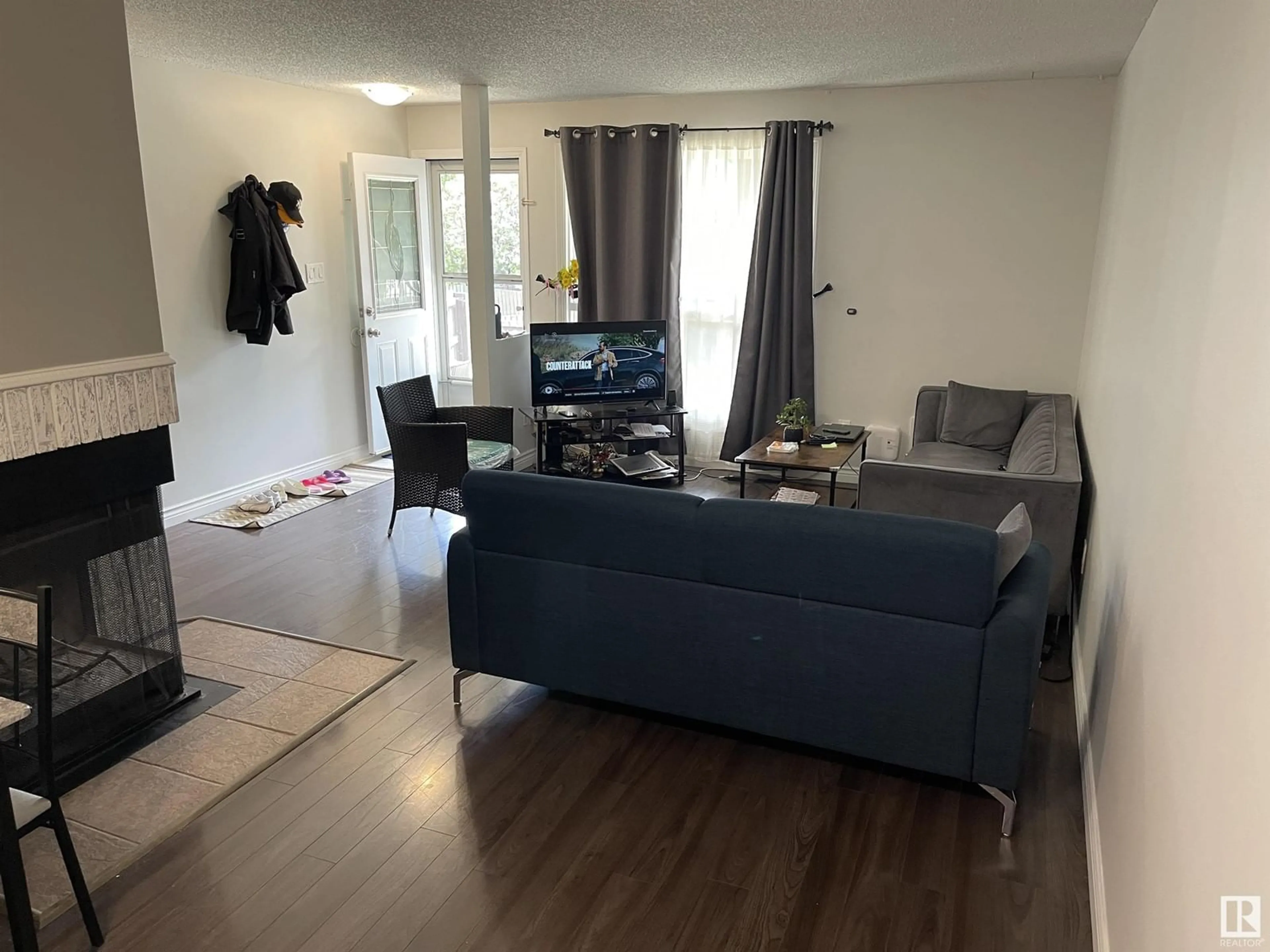 Living room with furniture, unknown for NW - 9235 172 ST, Edmonton Alberta T5T3C3
