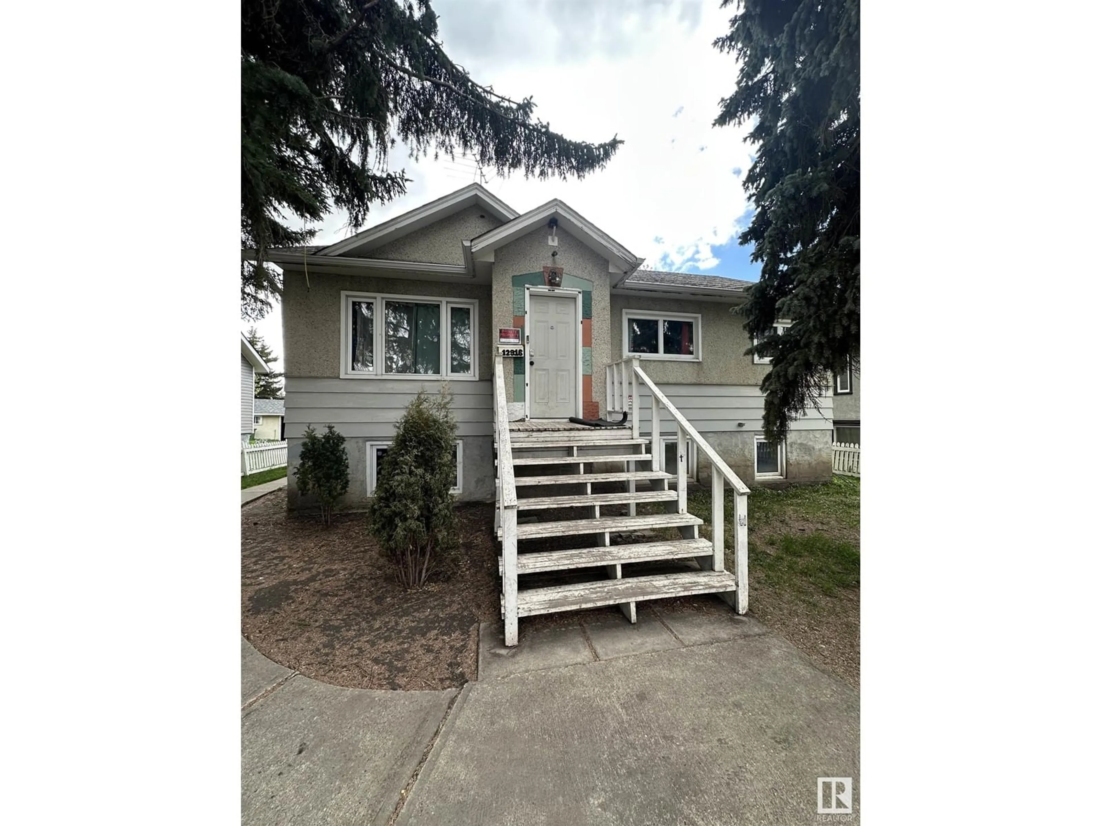 Home with vinyl exterior material, street for NW - 12916 123A ST, Edmonton Alberta T5L0K9
