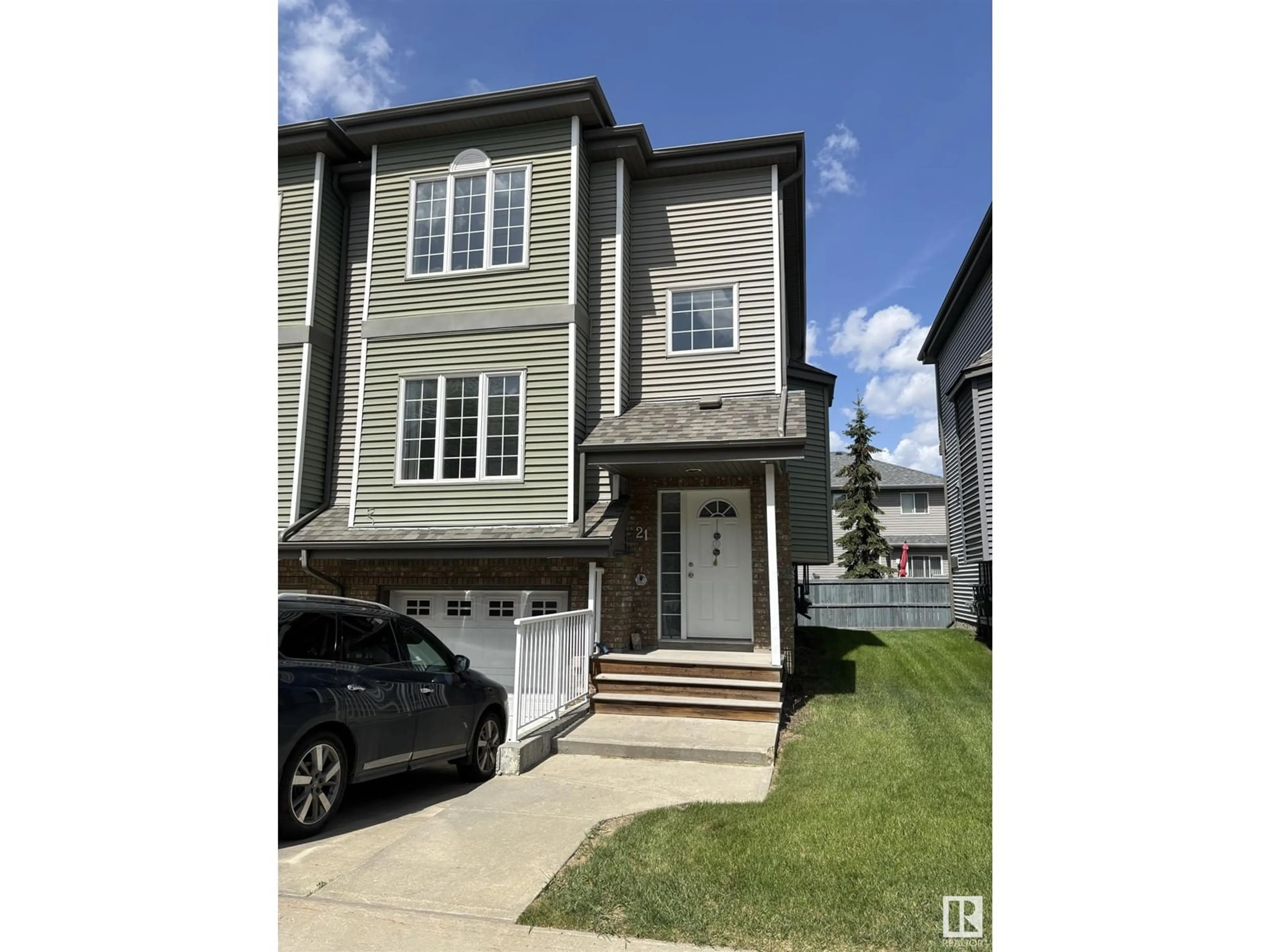 Home with vinyl exterior material, street for 21 - 5102 30 AV, Beaumont Alberta T4X0A9
