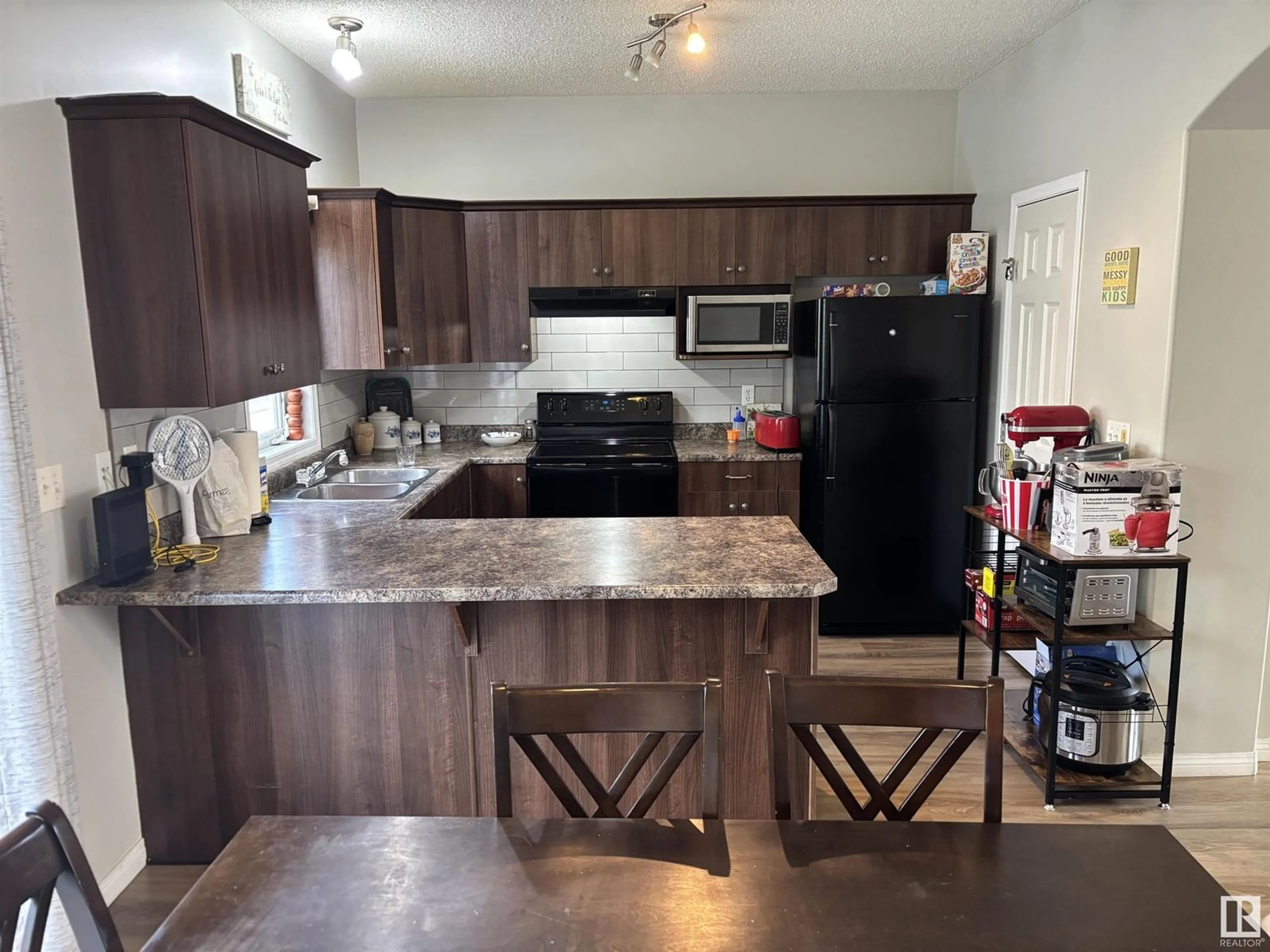 Open concept kitchen, unknown for 21 - 5102 30 AV, Beaumont Alberta T4X0A9