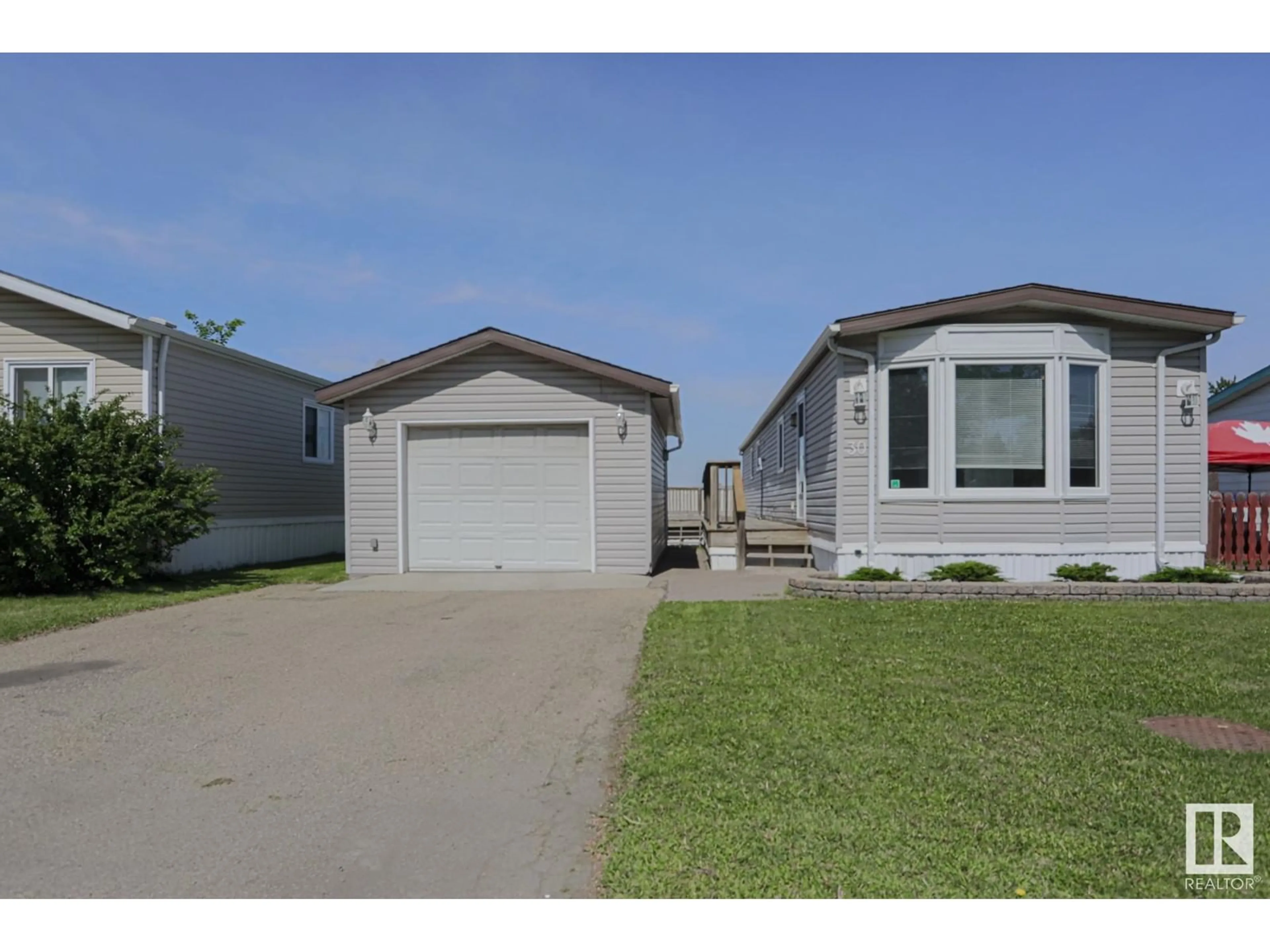 Home with vinyl exterior material, street for 30 MAPLE TC, Edmonton Alberta T6P1H6