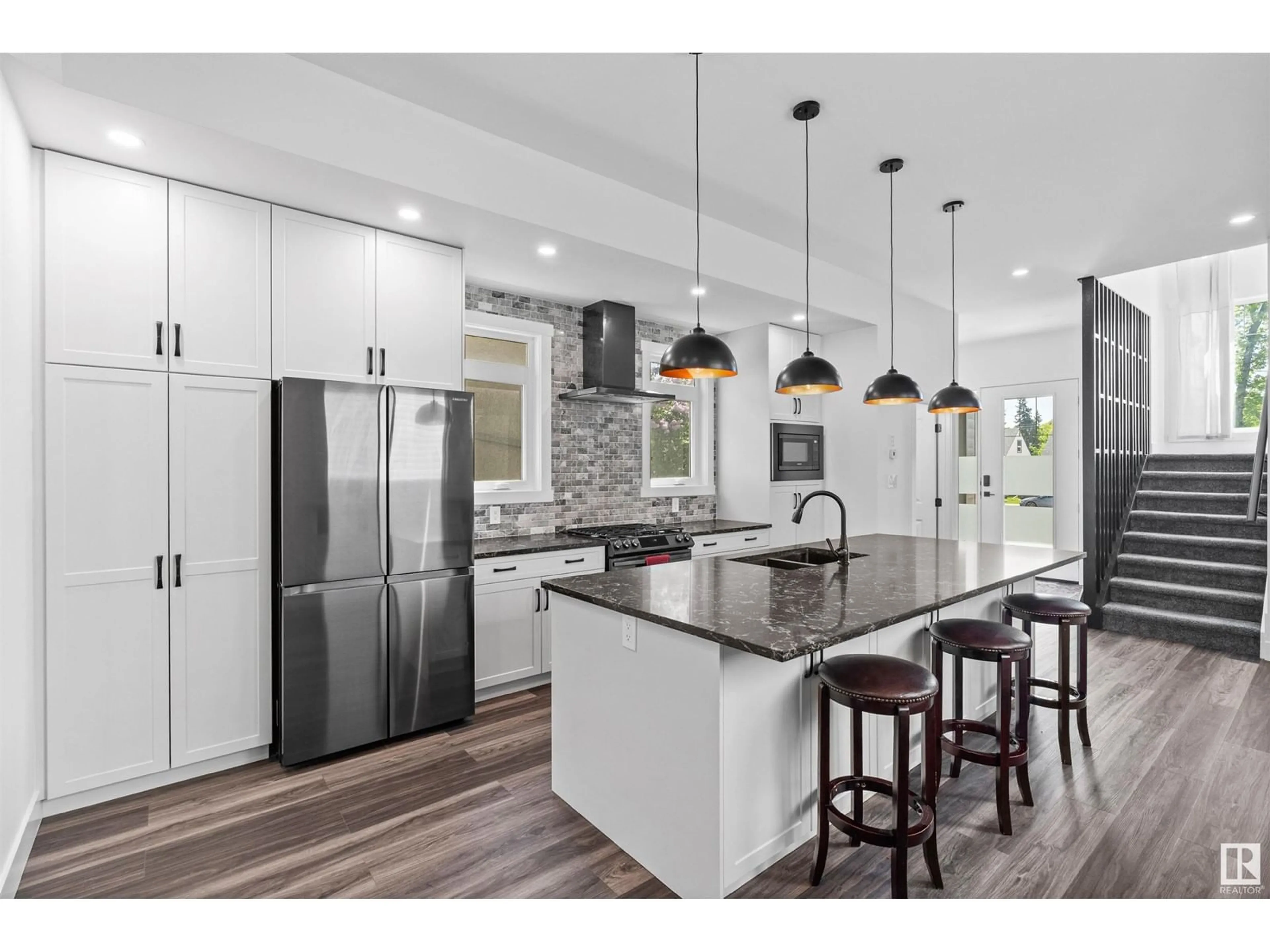 Open concept kitchen, unknown for 13916 118 AV, Edmonton Alberta T5L2M4