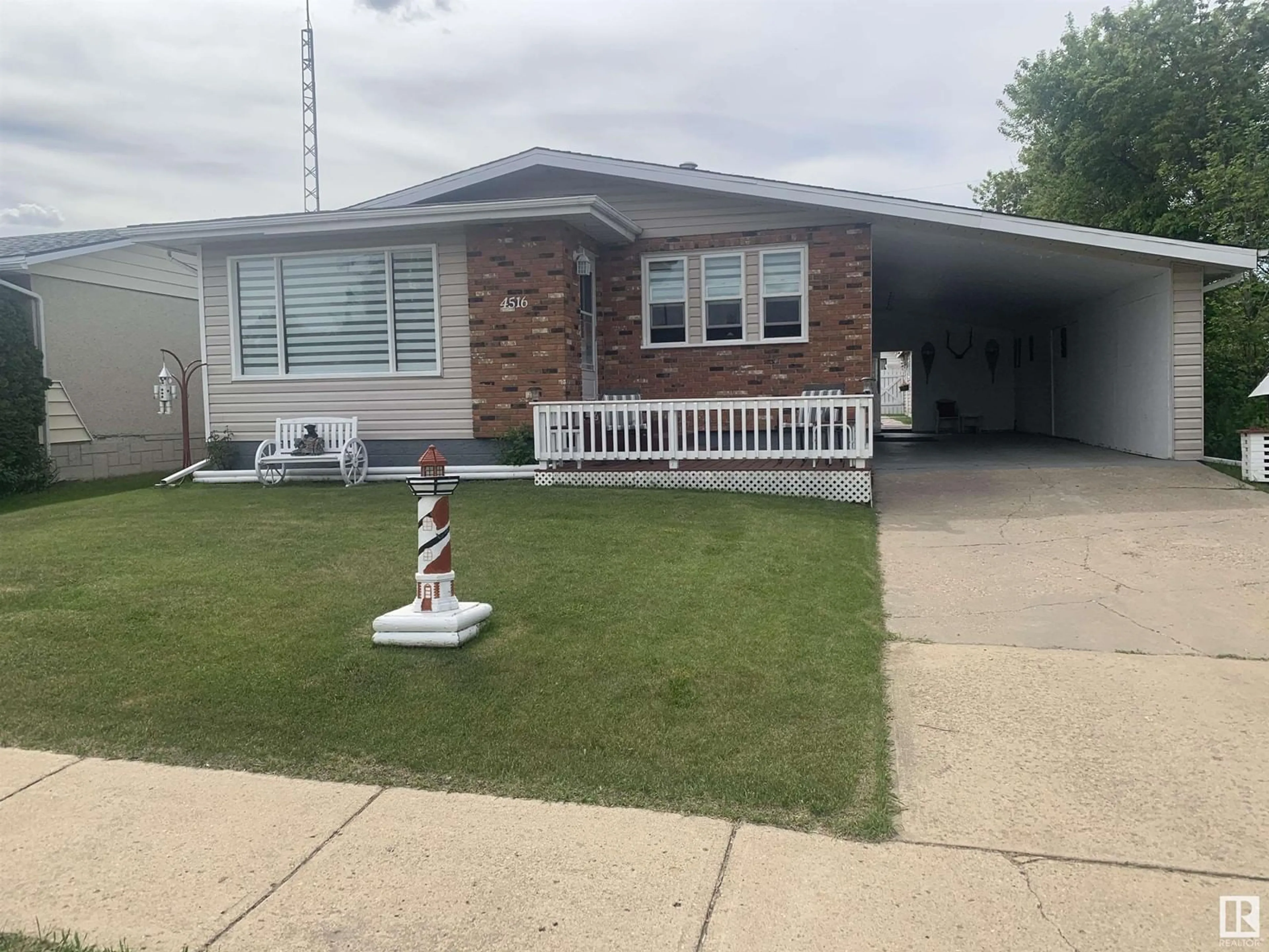 Home with vinyl exterior material, street for 4516 51 ST, Smoky Lake Town Alberta T0A3C0