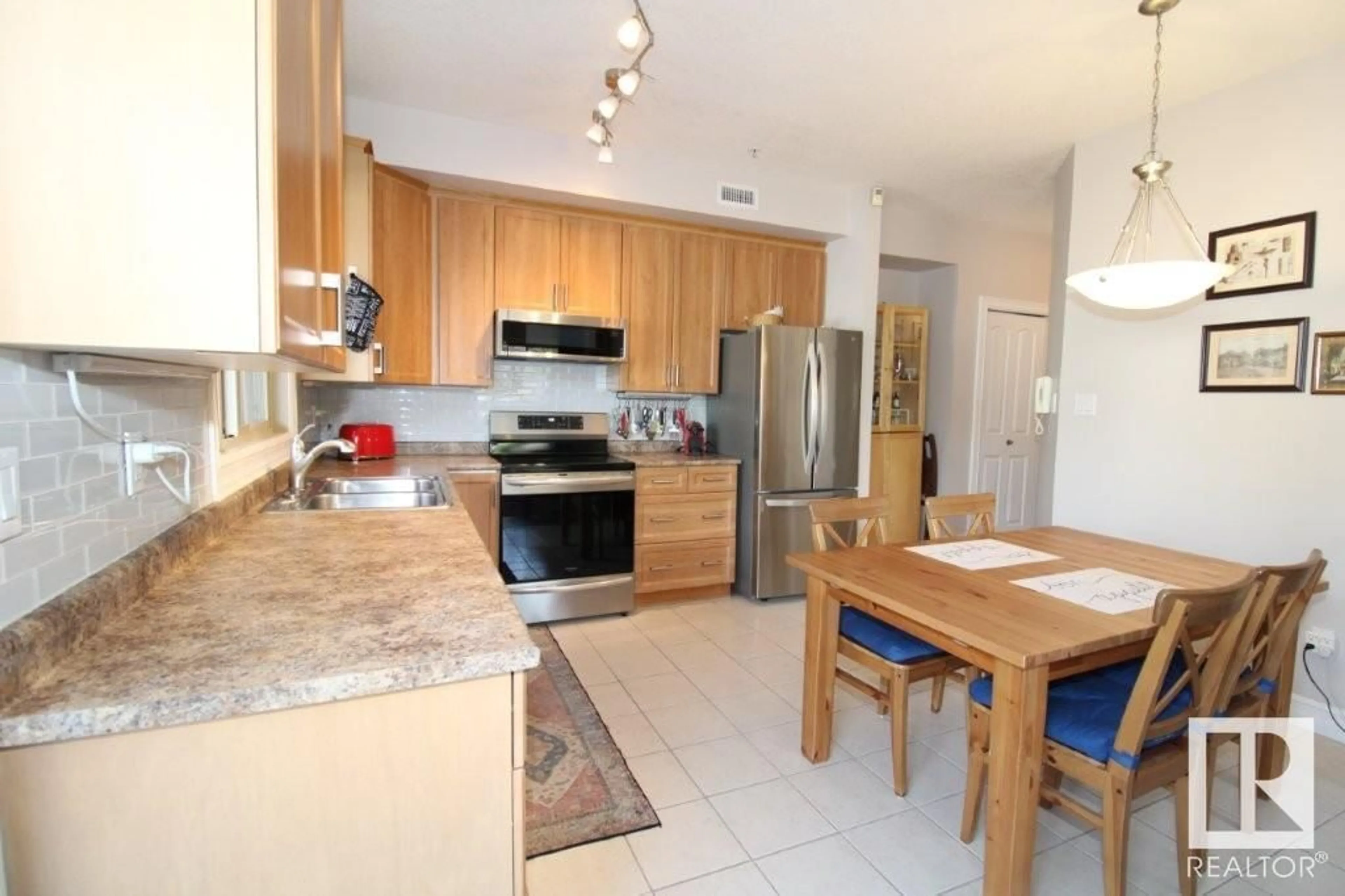 Open concept kitchen, unknown for #103 - 10630 78 AV, Edmonton Alberta T6E1P5