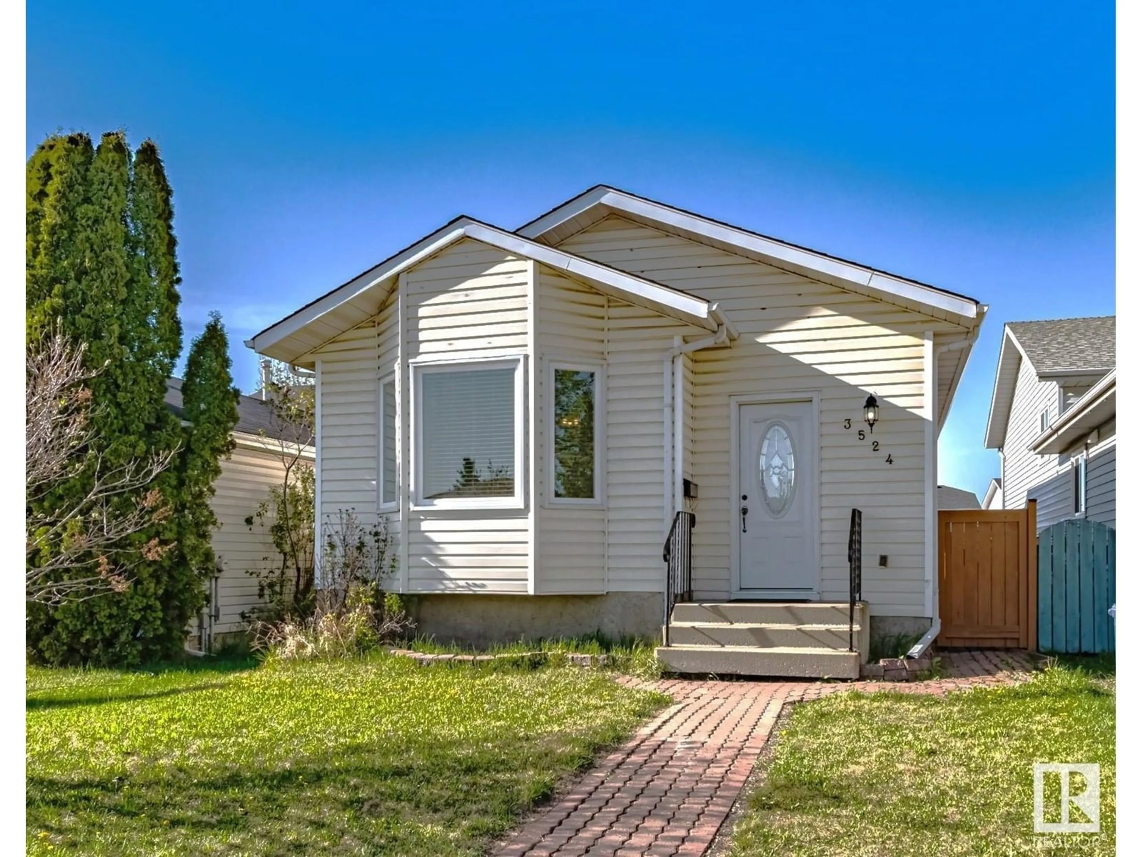 Home with vinyl exterior material, street for 3524 44A AV NW, Edmonton Alberta T6L6K6