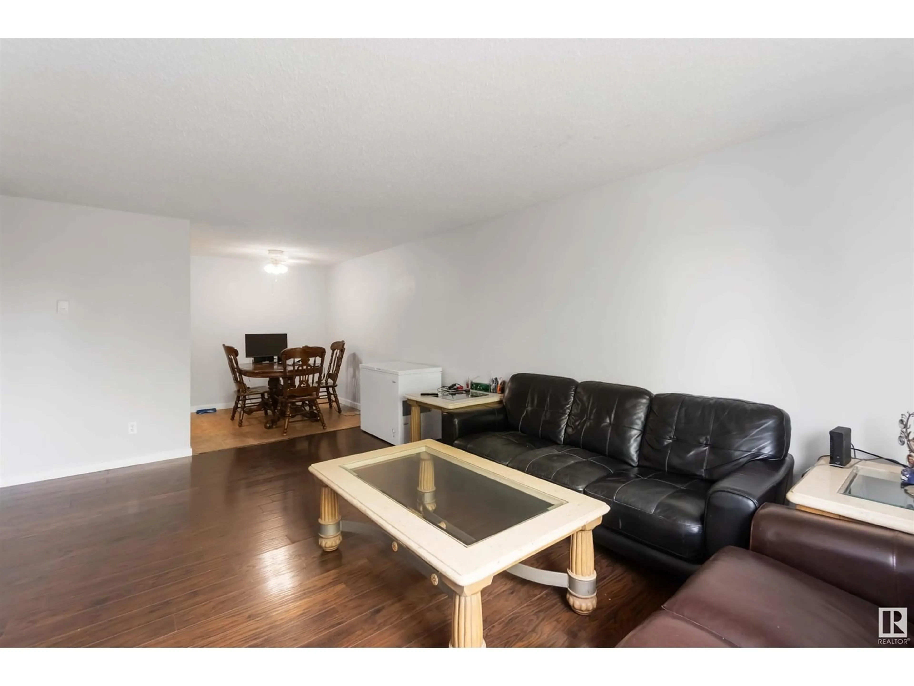 Living room with furniture, wood/laminate floor for #413 - 4608 52 AV, Stony Plain Alberta T7Z1N7