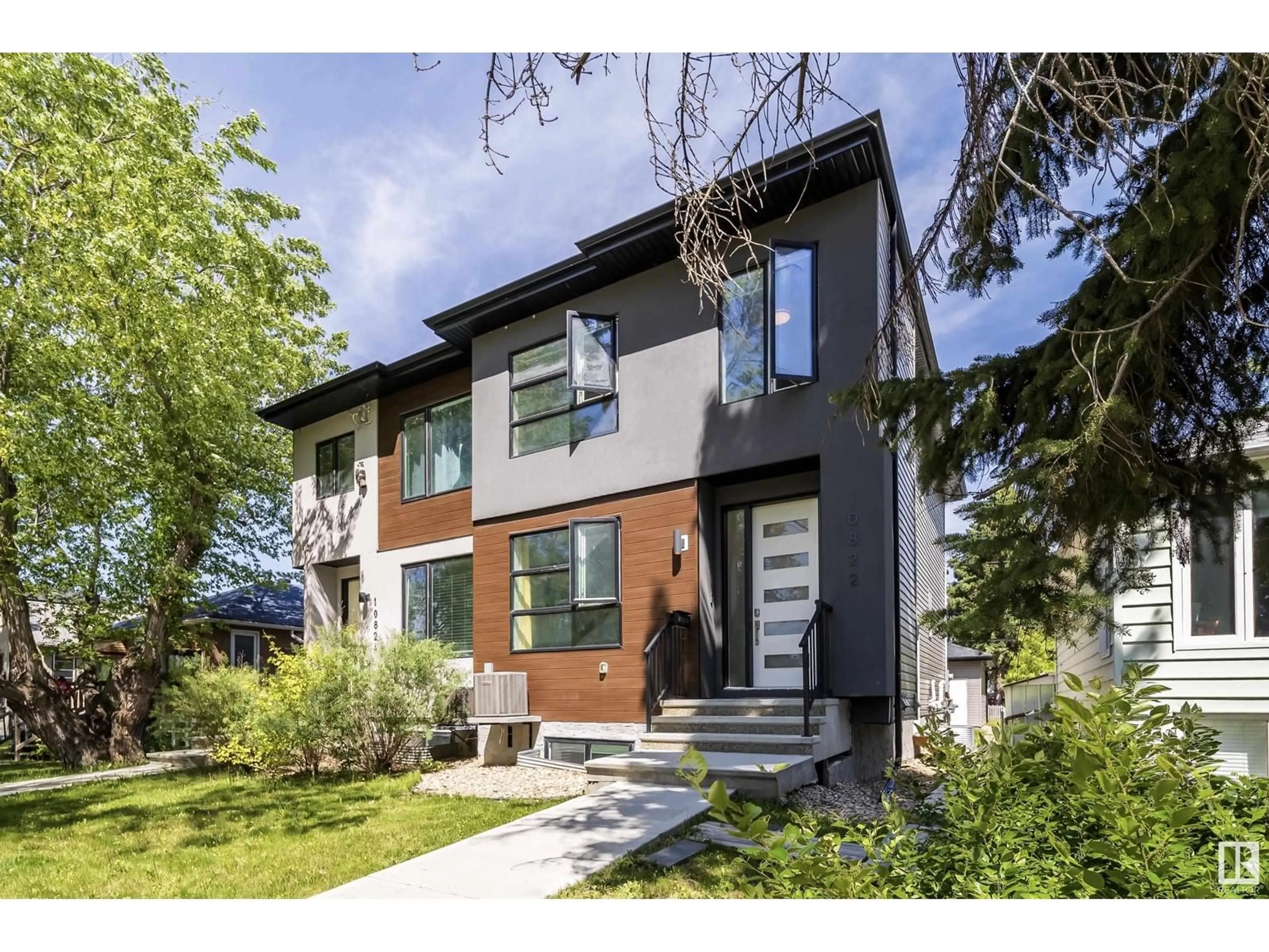 Home with brick exterior material, street for NW - 10822 66 AV, Edmonton Alberta T6H1X9