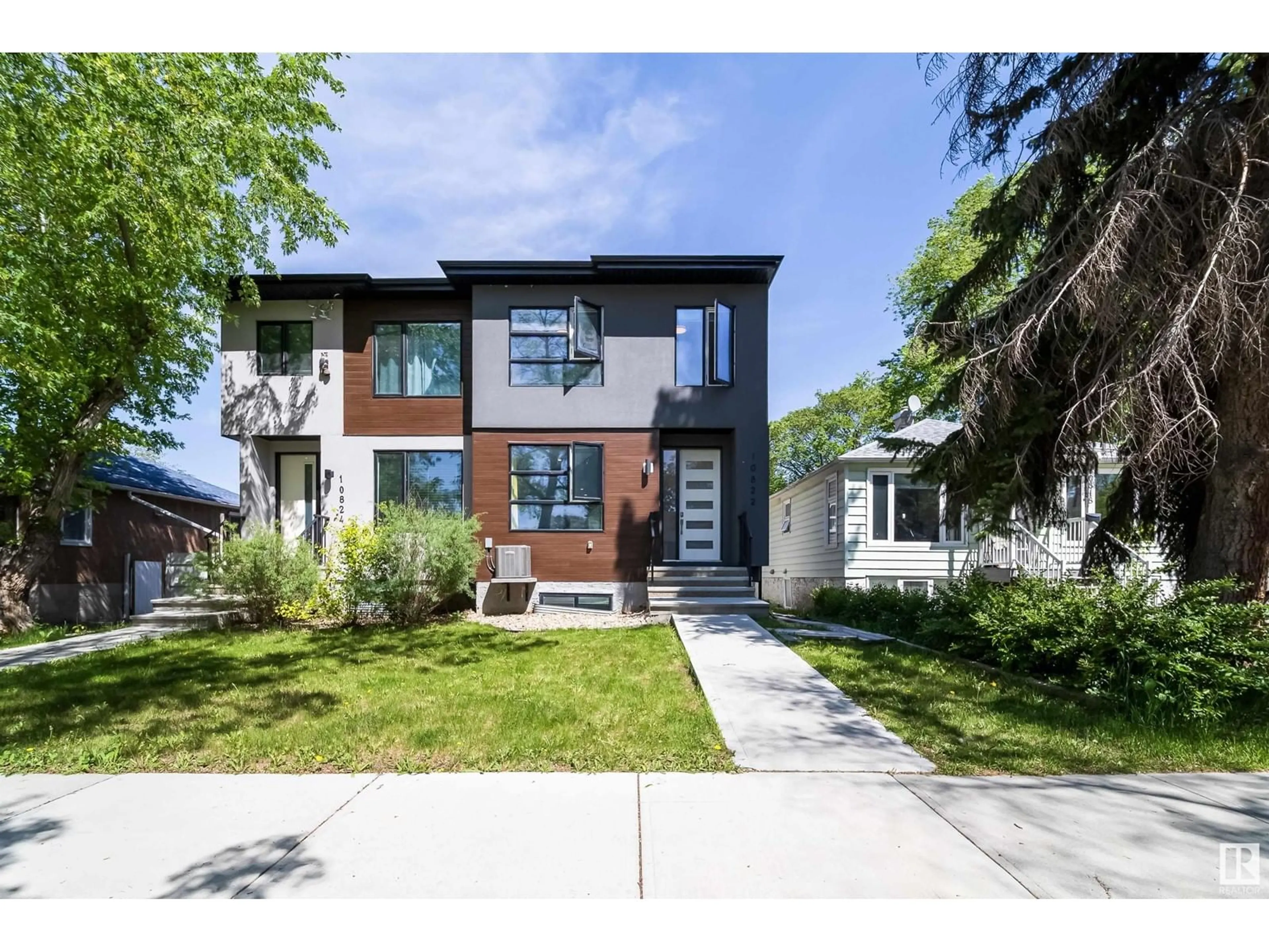 Home with brick exterior material, street for NW - 10822 66 AV, Edmonton Alberta T6H1X9