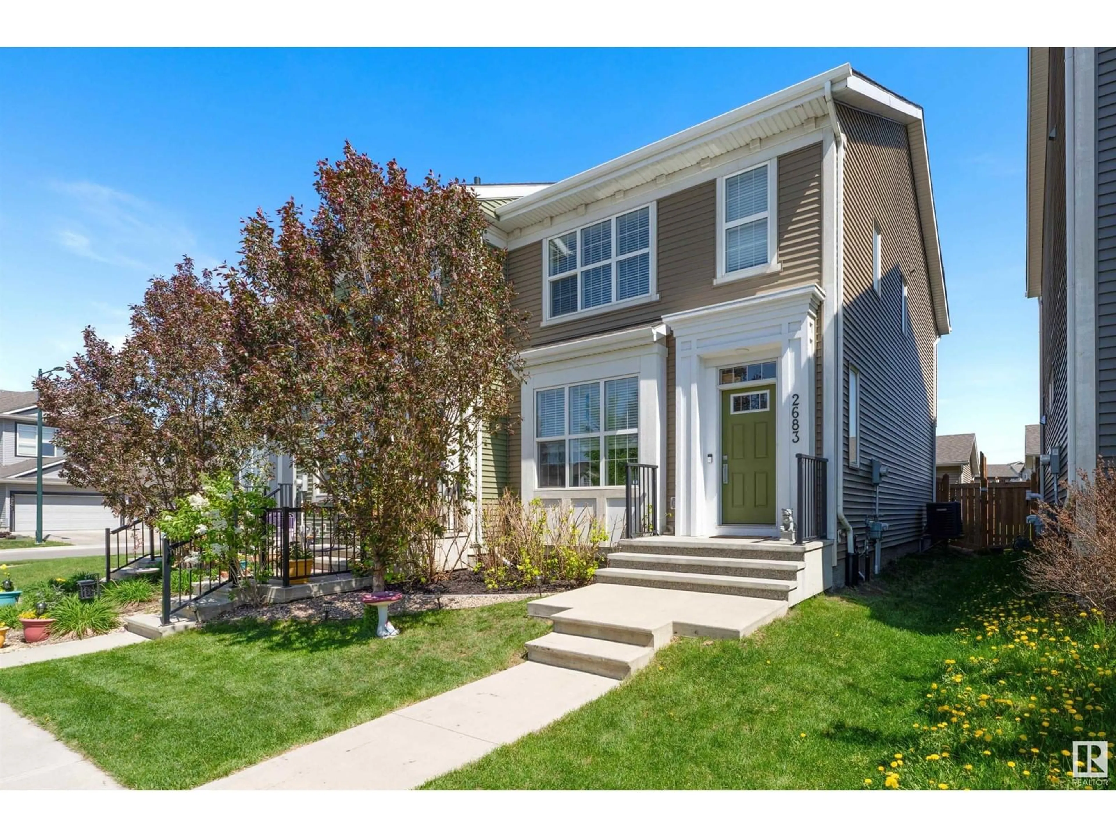 Home with vinyl exterior material, street for 2683 MAPLE WY, Edmonton Alberta T6T2C8