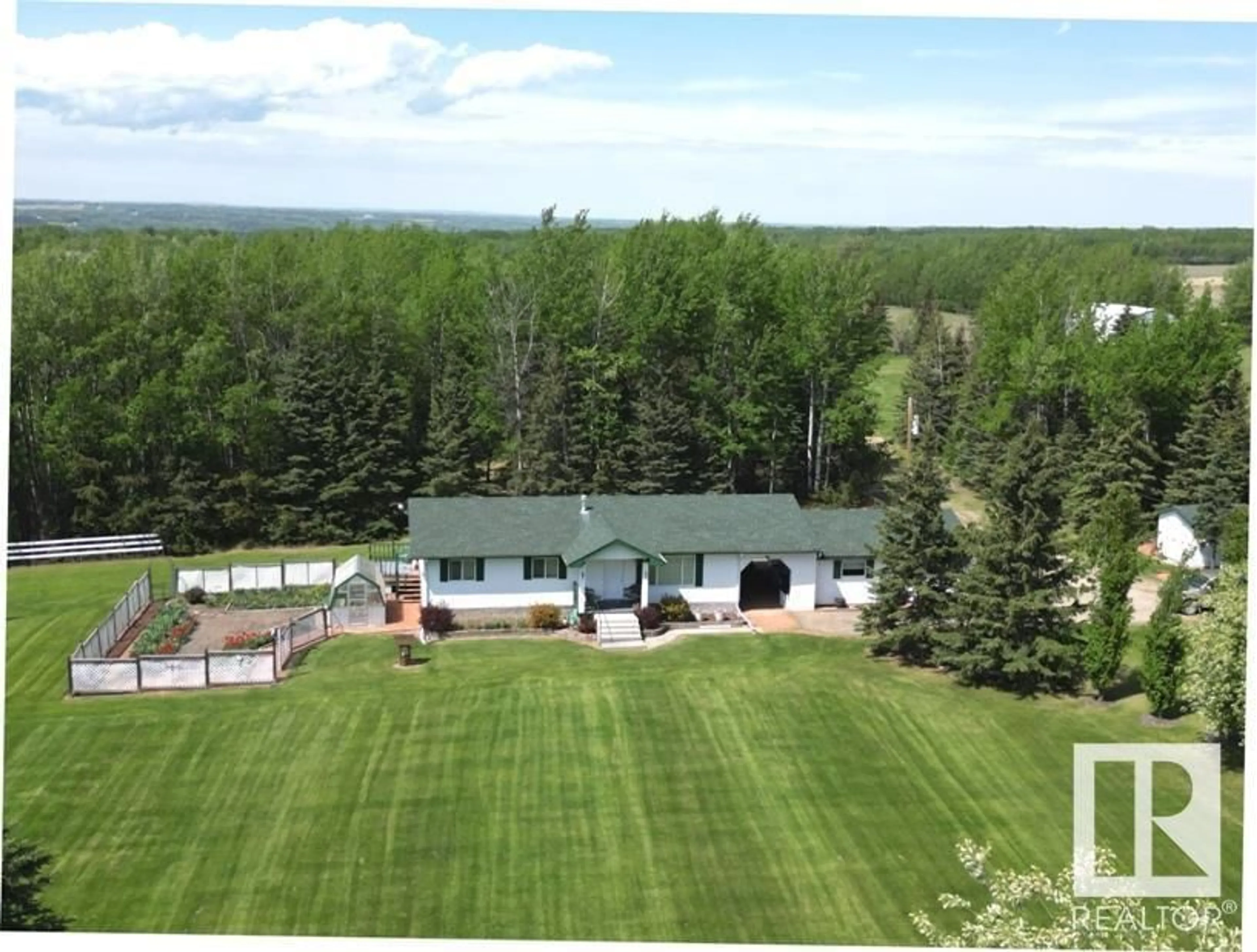 A pic from outside/outdoor area/front of a property/back of a property/a pic from drone, mountain view for 470048 RGE ROAD 25, Rural Wetaskiwin County Alberta T0C2X0