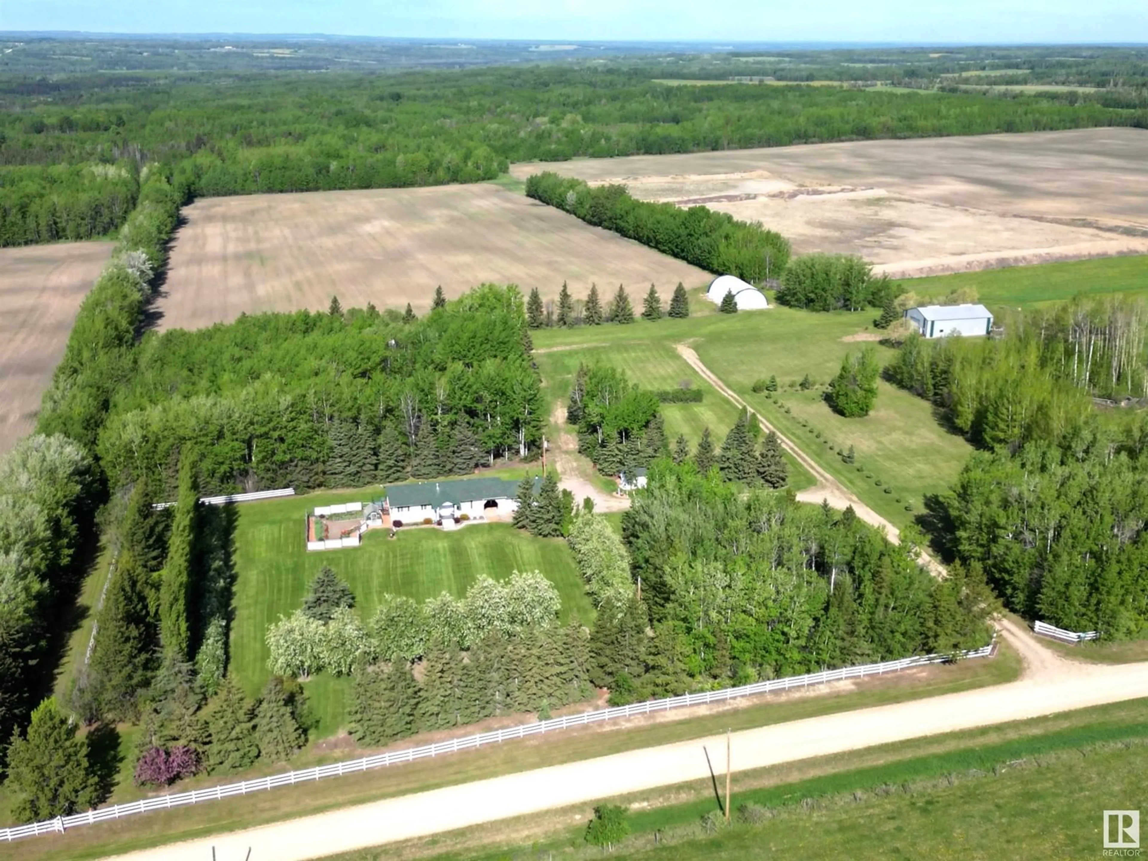 A pic from outside/outdoor area/front of a property/back of a property/a pic from drone, forest/trees view for 470048 RGE ROAD 25, Rural Wetaskiwin County Alberta T0C2X0