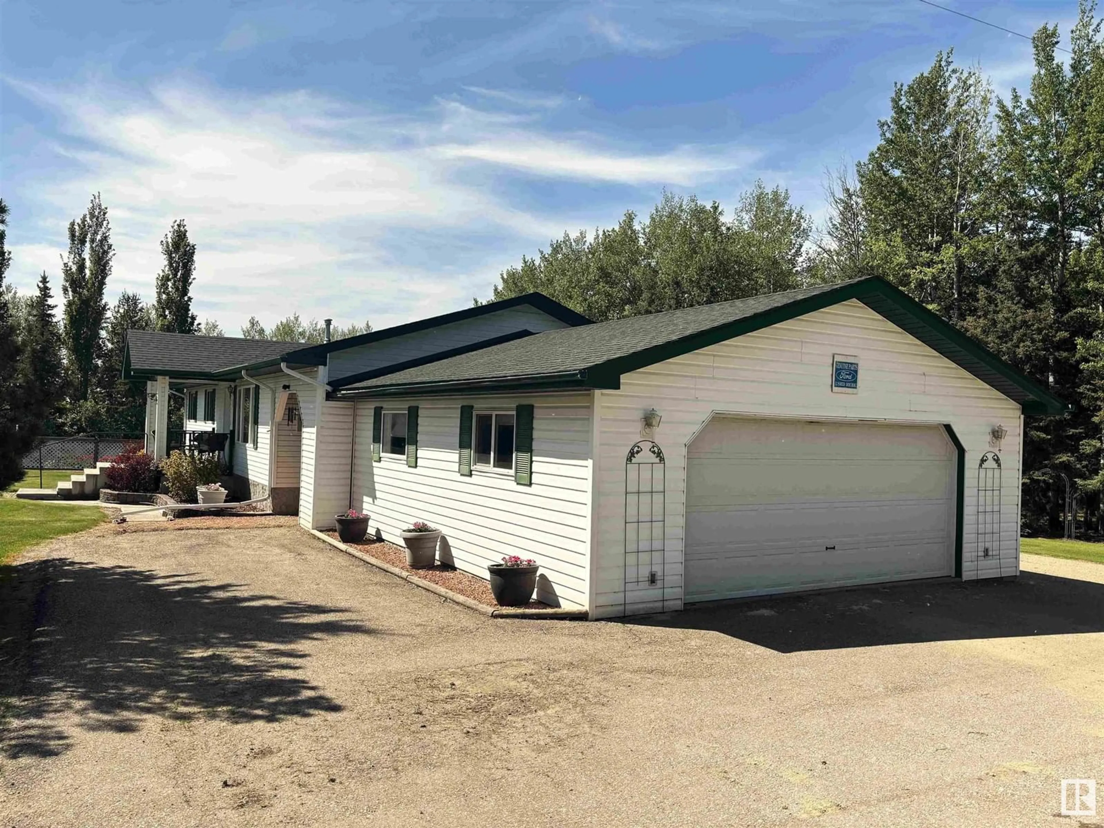 Home with vinyl exterior material, street for 470048 RGE ROAD 25, Rural Wetaskiwin County Alberta T0C2X0