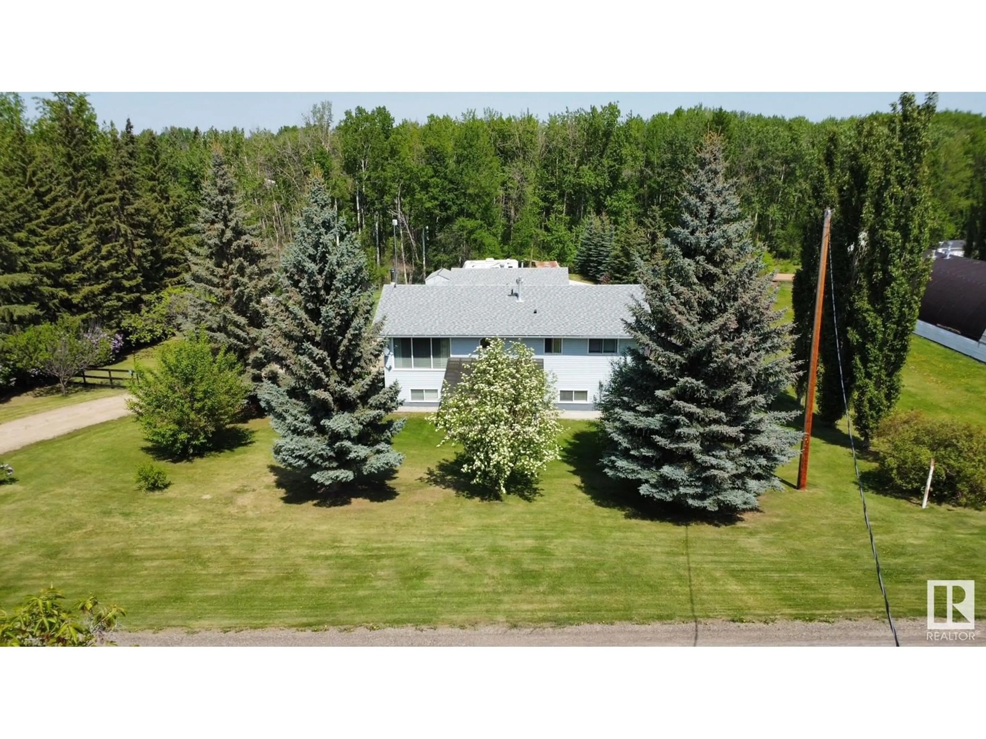 A pic from outside/outdoor area/front of a property/back of a property/a pic from drone, forest/trees view for #4 - 2228 PARKLAND DR, Rural Parkland County Alberta T7Y2L2