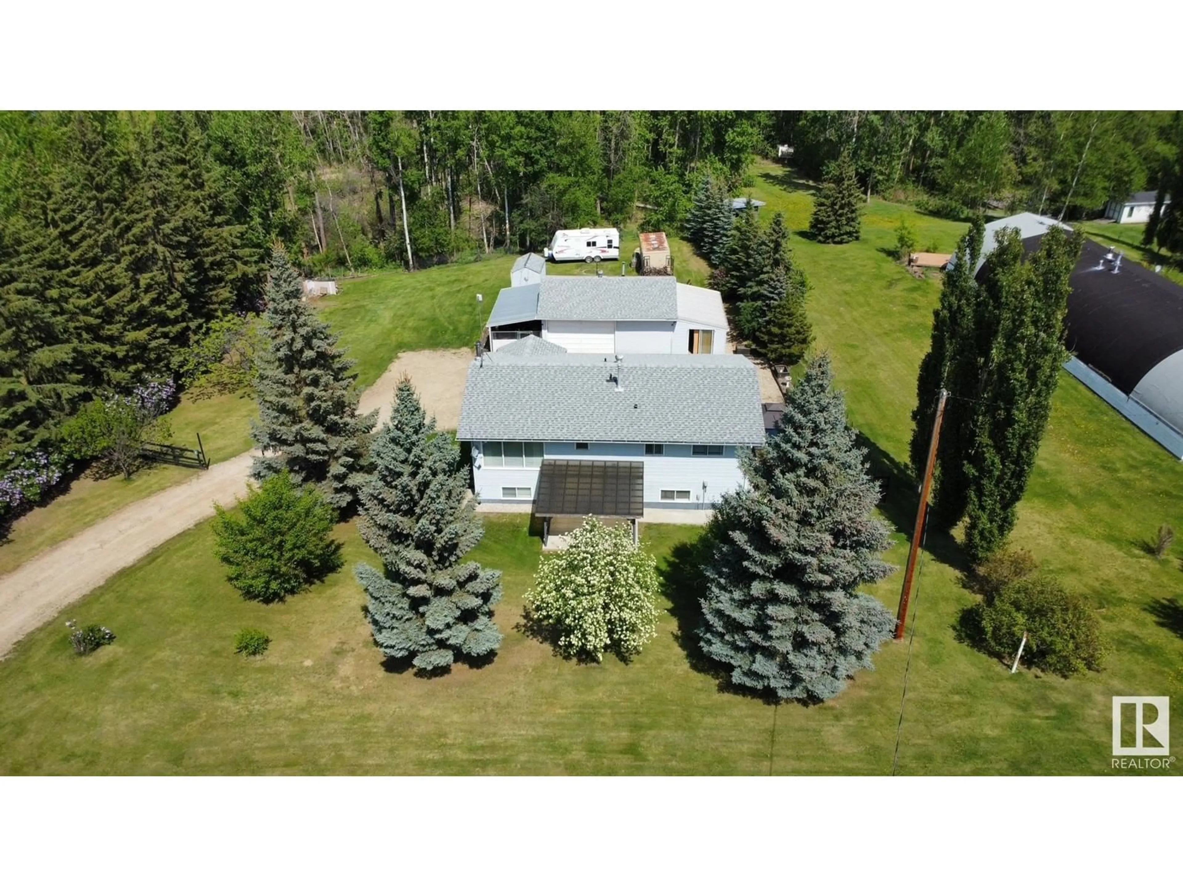 A pic from outside/outdoor area/front of a property/back of a property/a pic from drone, unknown for #4 - 2228 PARKLAND DR, Rural Parkland County Alberta T7Y2L2