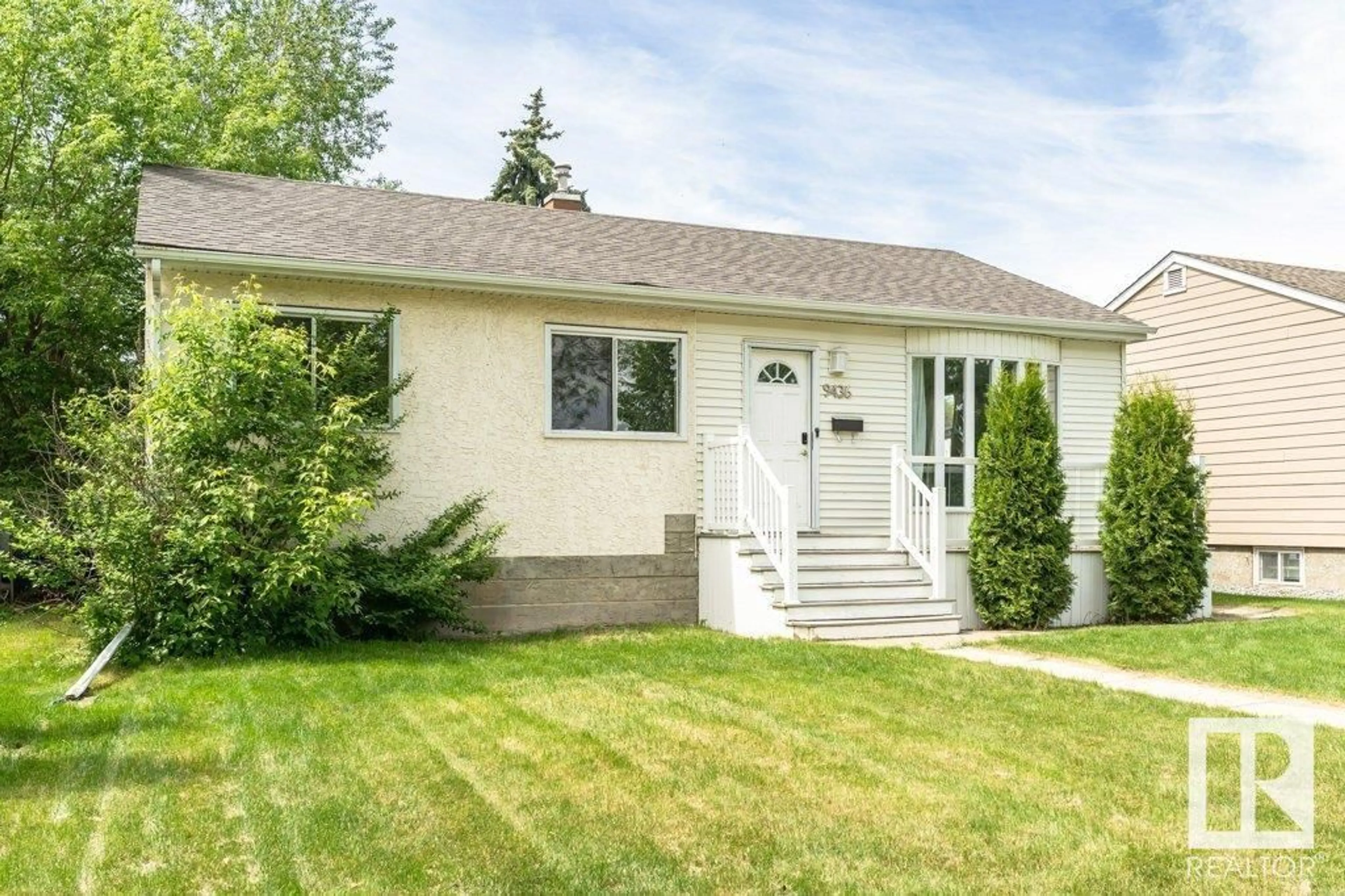 Home with vinyl exterior material, street for 9436 76 ST, Edmonton Alberta T6C2K6