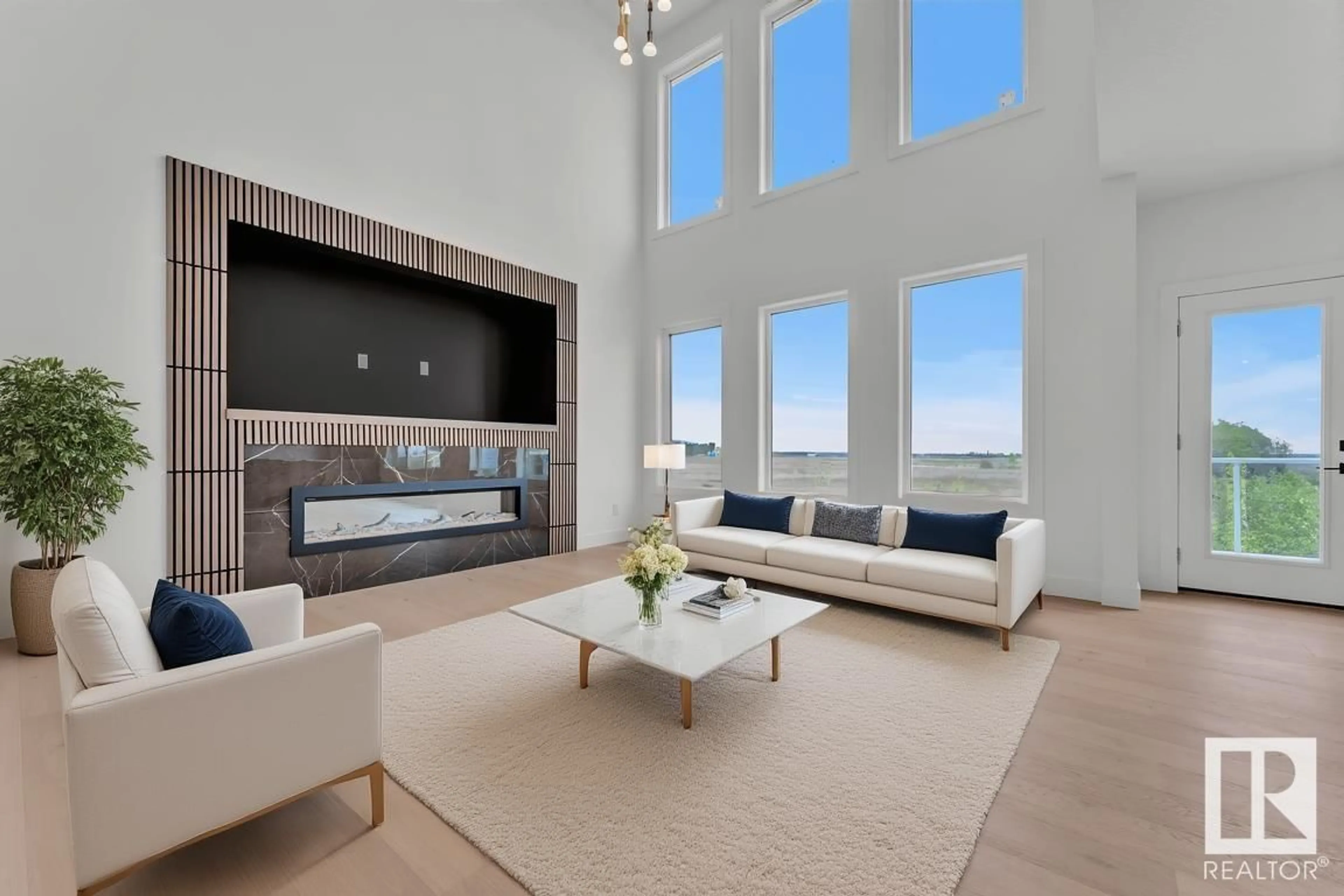 Living room with furniture, ceramic/tile floor for 324 ASTON CL, Leduc Alberta T9E1H9