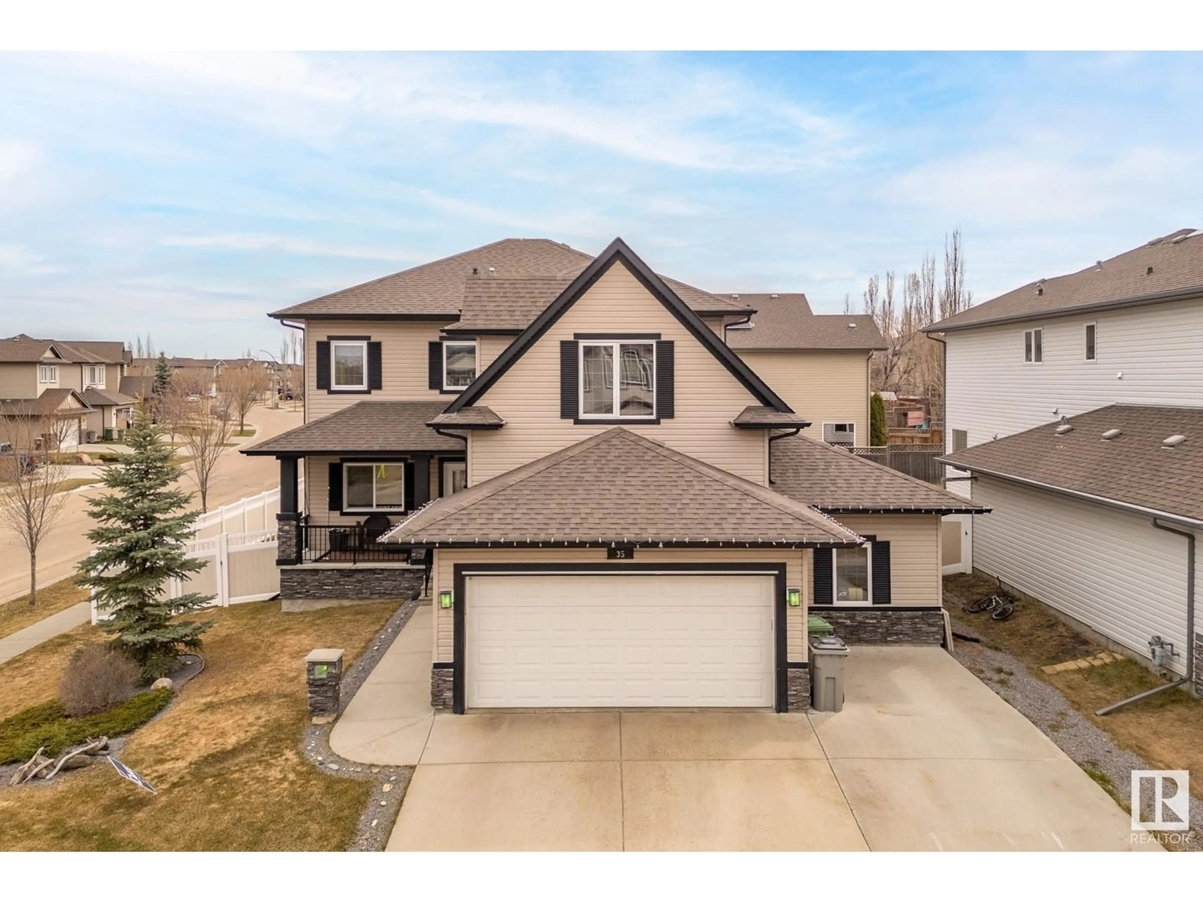 A pic from outside/outdoor area/front of a property/back of a property/a pic from drone, street for 35 RUE BOUCHARD, Beaumont Alberta T4X0E6