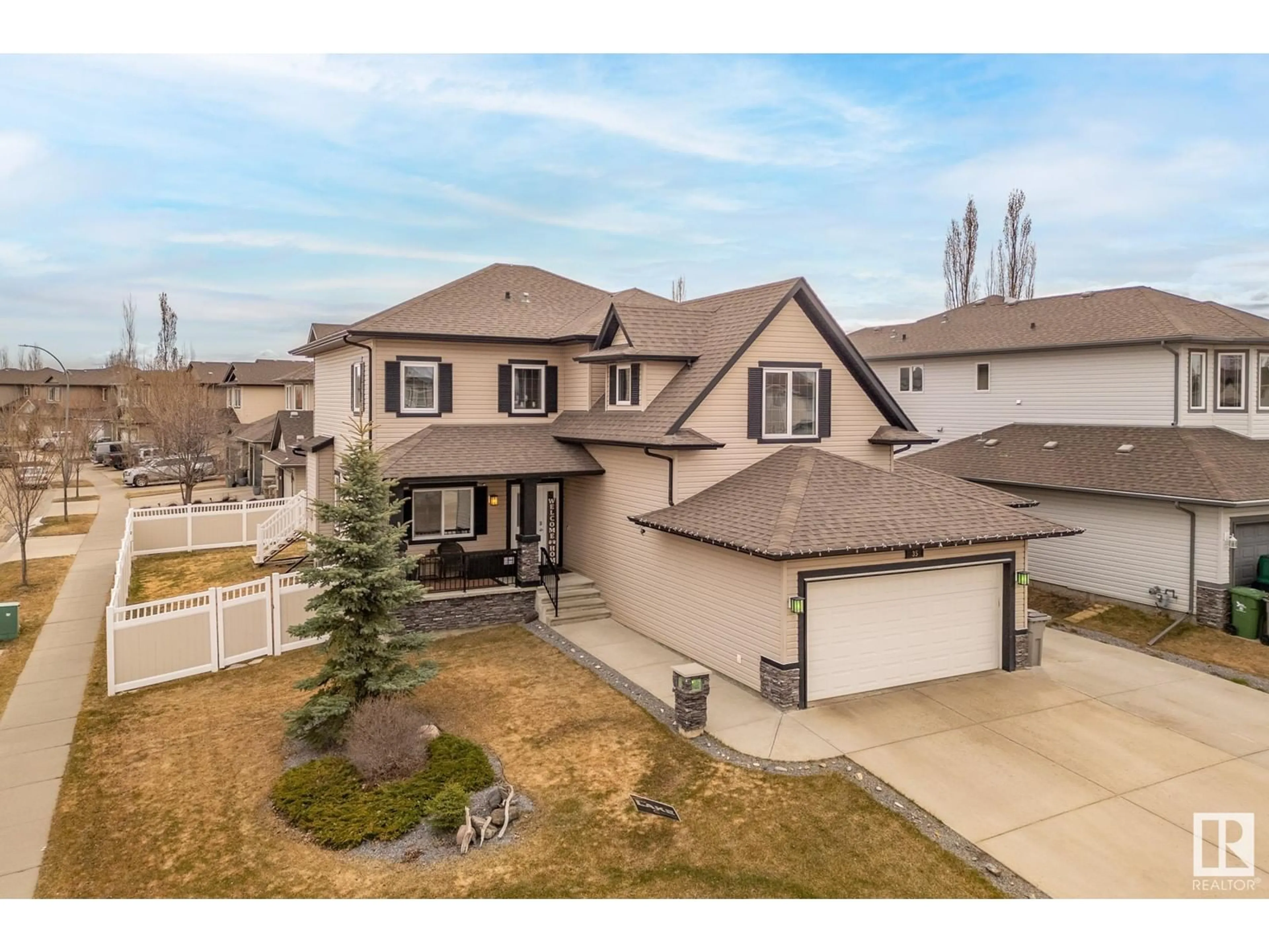 A pic from outside/outdoor area/front of a property/back of a property/a pic from drone, street for 35 RUE BOUCHARD, Beaumont Alberta T4X0E6