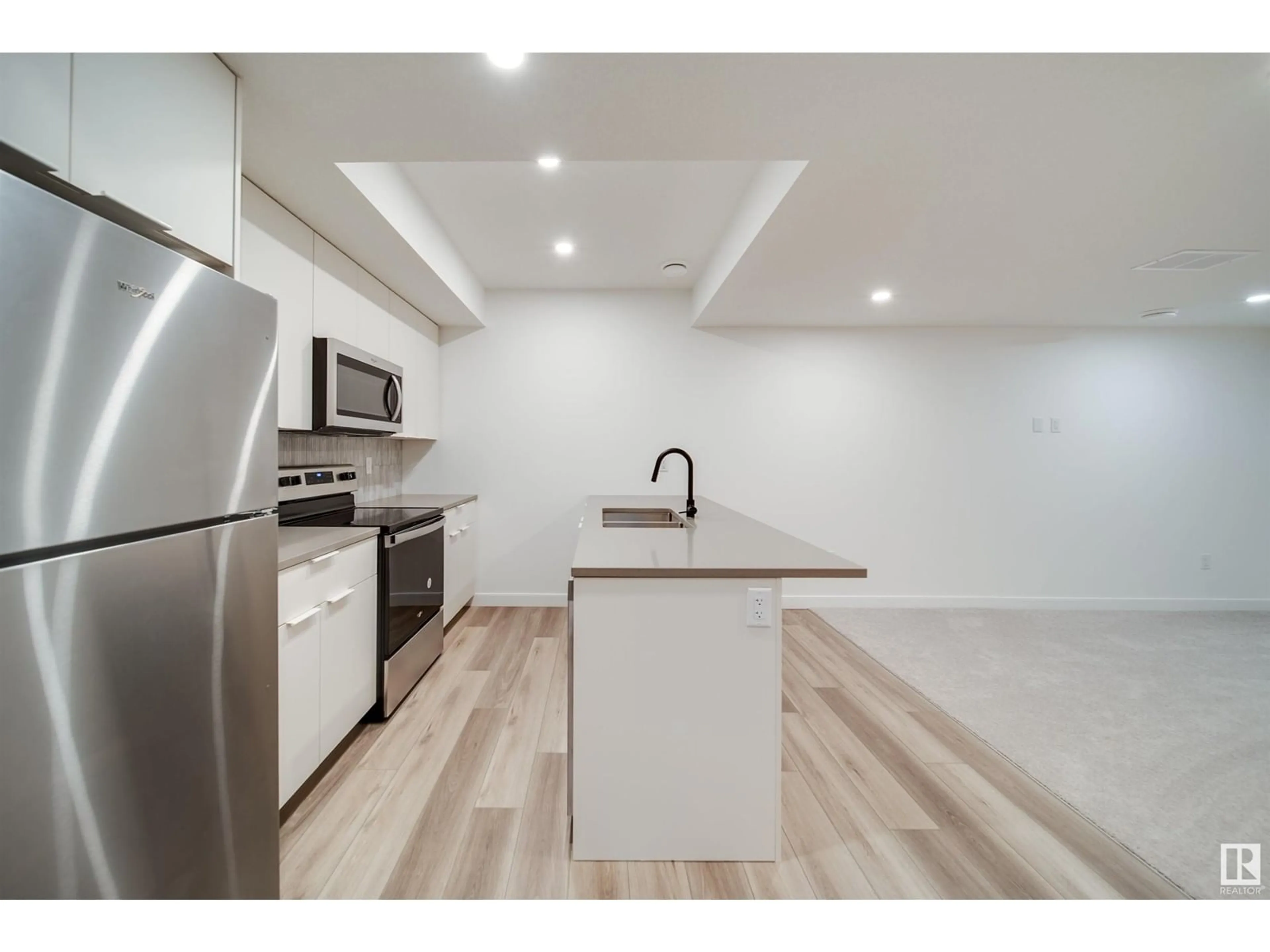 Open concept kitchen, unknown for 8522 80 AV NW, Edmonton Alberta T6C0W3
