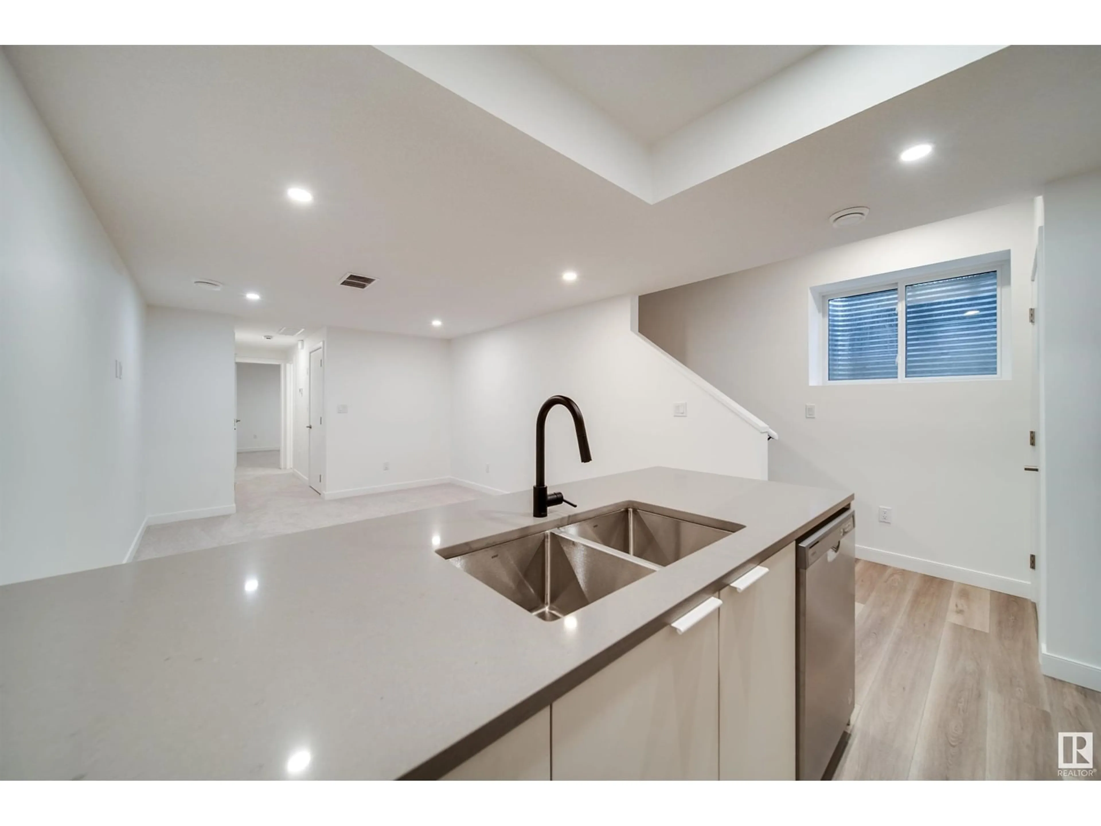 Open concept kitchen, ceramic/tile floor for 8522 80 AV NW, Edmonton Alberta T6C0W3