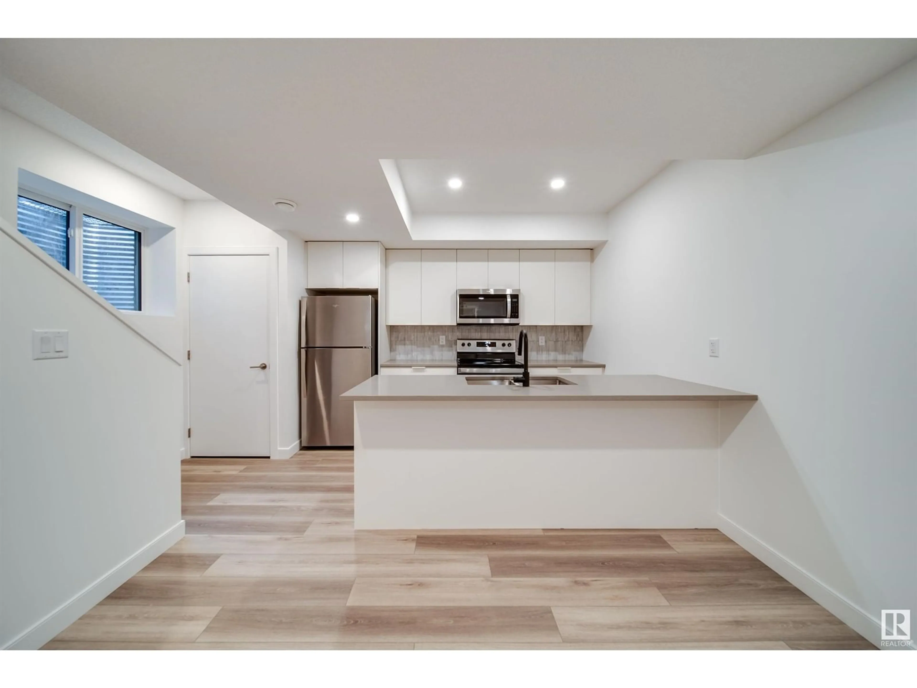 Open concept kitchen, unknown for 8522 80 AV NW, Edmonton Alberta T6C0W3