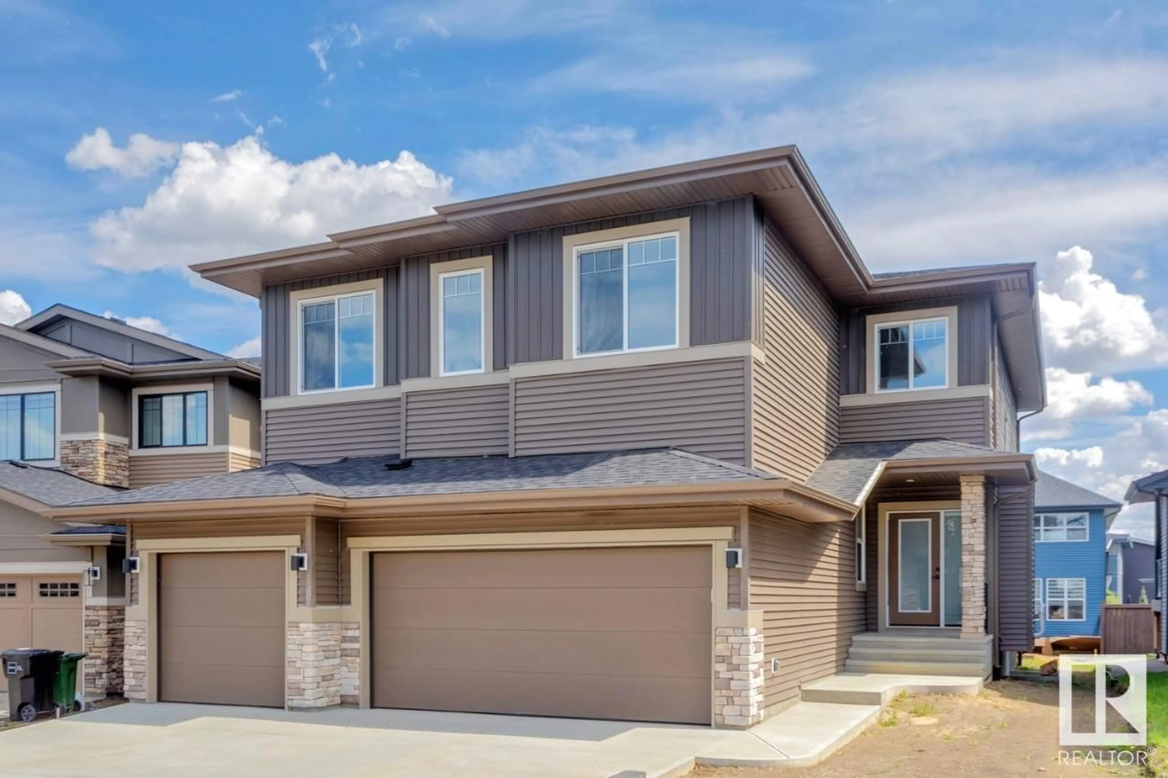 Home with brick exterior material, street for 20319 29 AV, Edmonton Alberta T6M0W5
