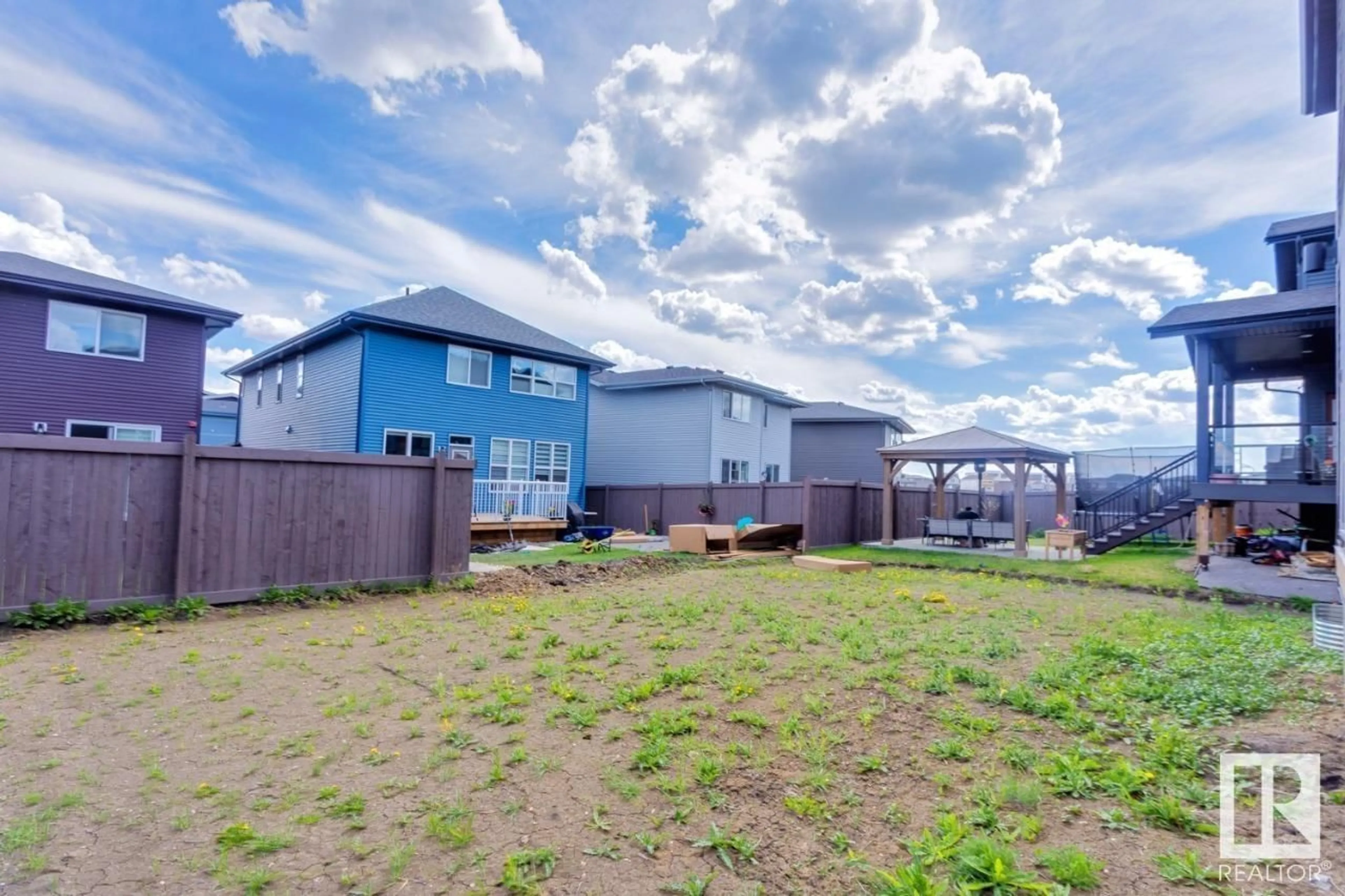 A pic from outside/outdoor area/front of a property/back of a property/a pic from drone, water/lake/river/ocean view for 20319 29 AV, Edmonton Alberta T6M0W5